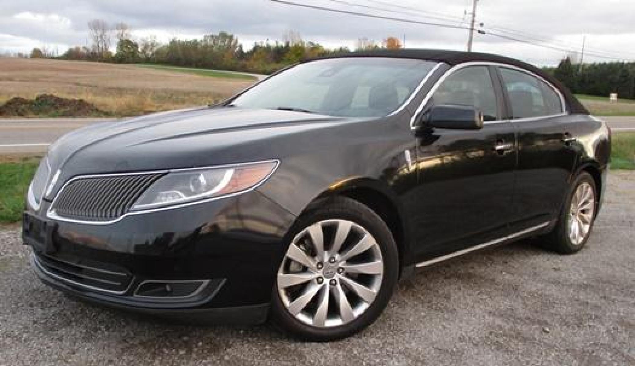 2014 Black /Black Lincoln MKS (1LNHL9EK3EG) with an 3.5L V6 DOHC 24V engine, 6-Speed Automatic transmission, located at 1725 US-68 N, Bellefontaine, OH, 43311, (937) 592-5466, 40.387783, -83.752388 - Presented in stunning Tuxedo Black, our 2014 Lincoln MKS "TUXEDO EDITION" AWD offers a superb blend of refined style and performance. Under the hood is a 3.7 Liter V6 that generates a healthy 305hp. This power is managed by a smooth shifting 6 Speed Automatic transmission that rewards you with impre - Photo #1