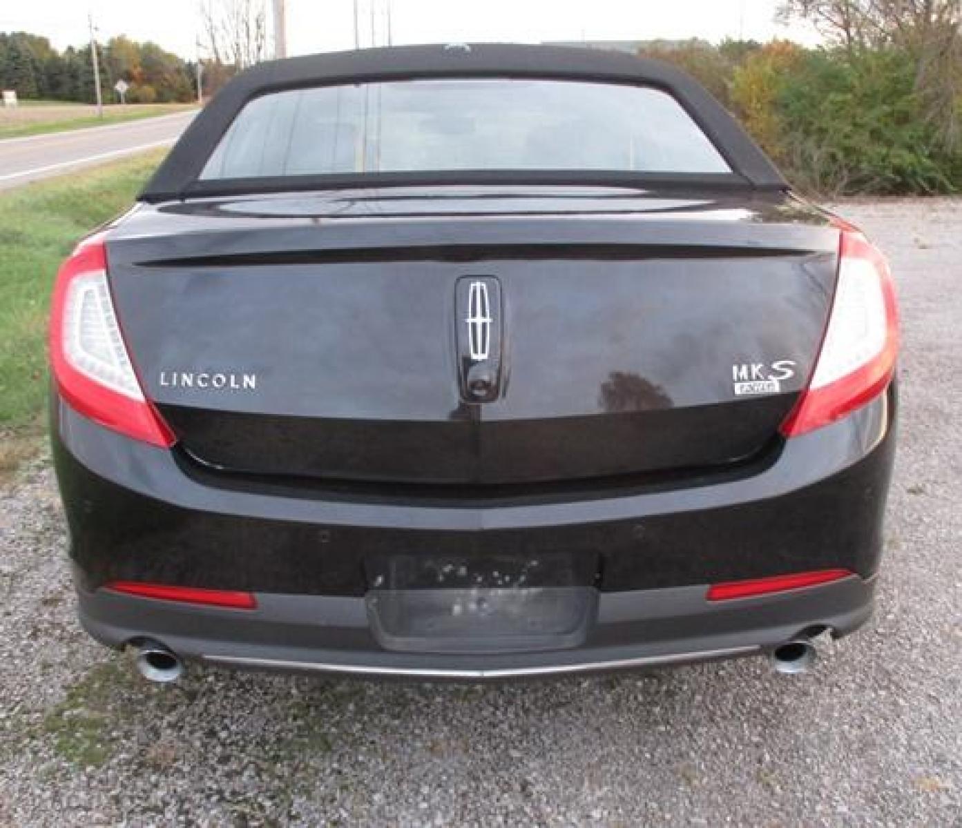 2014 Black /Black Lincoln MKS (1LNHL9EK3EG) with an 3.5L V6 DOHC 24V engine, 6-Speed Automatic transmission, located at 1725 US-68 N, Bellefontaine, OH, 43311, (937) 592-5466, 40.387783, -83.752388 - Photo #10