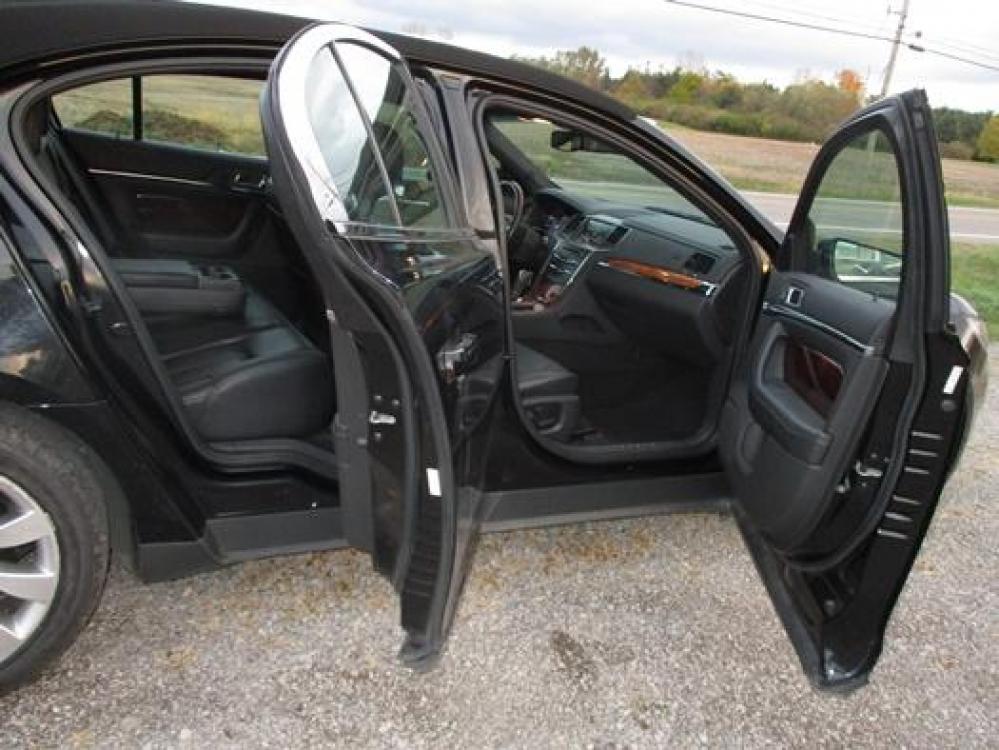 2014 Black /Black Lincoln MKS (1LNHL9EK3EG) with an 3.5L V6 DOHC 24V engine, 6-Speed Automatic transmission, located at 1725 US-68 N, Bellefontaine, OH, 43311, (937) 592-5466, 40.387783, -83.752388 - Presented in stunning Tuxedo Black, our 2014 Lincoln MKS 