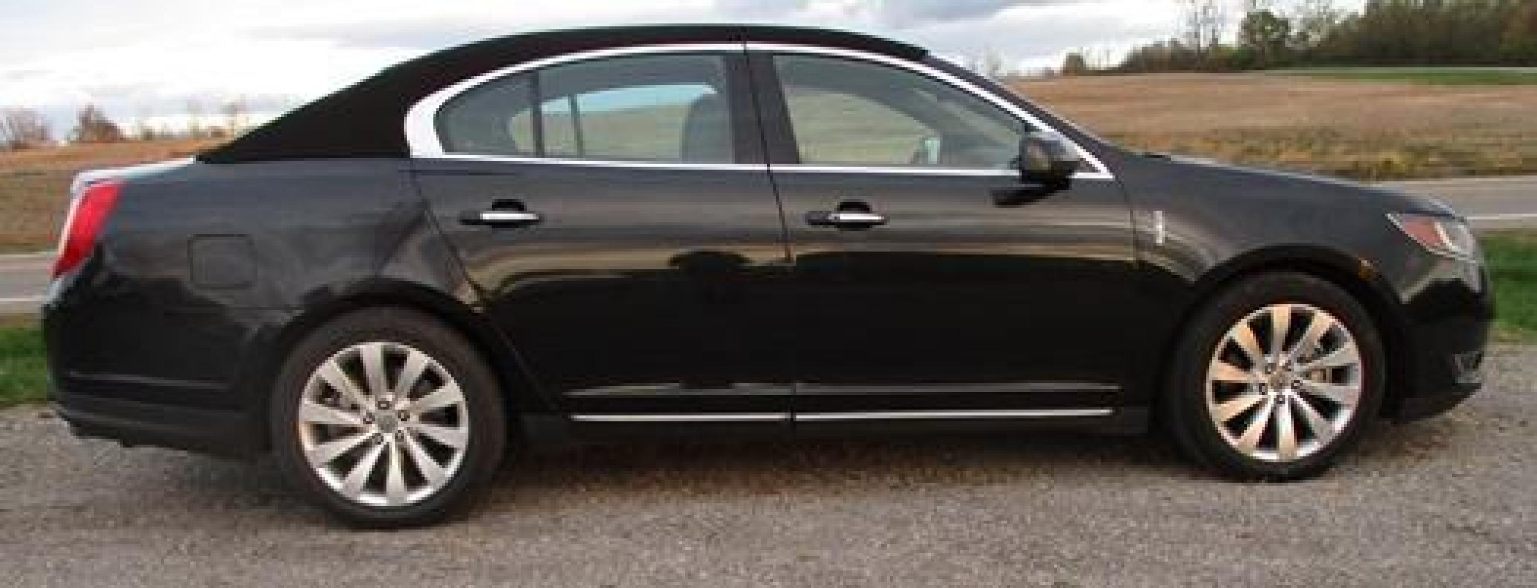 2014 Black /Black Lincoln MKS (1LNHL9EK3EG) with an 3.5L V6 DOHC 24V engine, 6-Speed Automatic transmission, located at 1725 US-68 N, Bellefontaine, OH, 43311, (937) 592-5466, 40.387783, -83.752388 - Presented in stunning Tuxedo Black, our 2014 Lincoln MKS "TUXEDO EDITION" AWD offers a superb blend of refined style and performance. Under the hood is a 3.7 Liter V6 that generates a healthy 305hp. This power is managed by a smooth shifting 6 Speed Automatic transmission that rewards you with impre - Photo #5