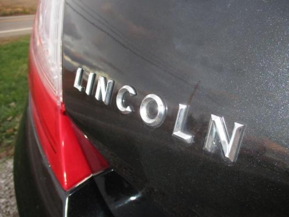 2014 Black /Black Lincoln MKS (1LNHL9EK3EG) with an 3.5L V6 DOHC 24V engine, 6-Speed Automatic transmission, located at 1725 US-68 N, Bellefontaine, OH, 43311, (937) 592-5466, 40.387783, -83.752388 - Photo #9
