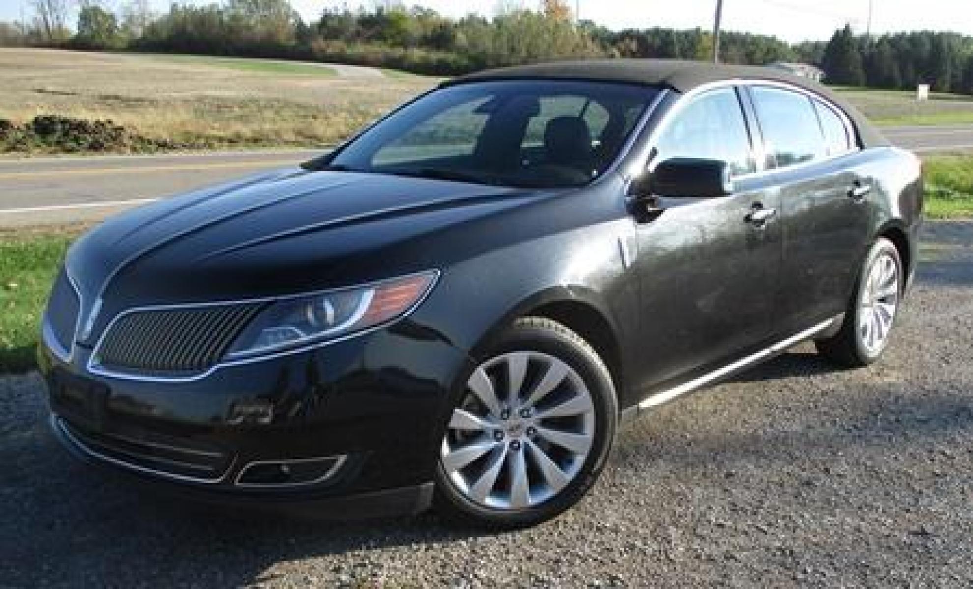 2014 Black /Black Lincoln MKS (1LNHL9EK7EG) with an 3.5L V6 DOHC 24V engine, 6-Speed Automatic transmission, located at 1725 US-68 N, Bellefontaine, OH, 43311, (937) 592-5466, 40.387783, -83.752388 - 2014 LINCOLN MKS "TUXEDO EDITION" AWD 3.7 v6, Auto, Black-Black Leather Int. w-power lumbar heated-cooled bucket seats, AM-FM-CD-MP3, Bluetooth, Sirius XM, NAVI, PW, PL, PB, PS w-tilt-cruise-controls, remote start, keyless entry, Power rear window sunshade, Presented in stunning Tuxedo Black, our - Photo #1