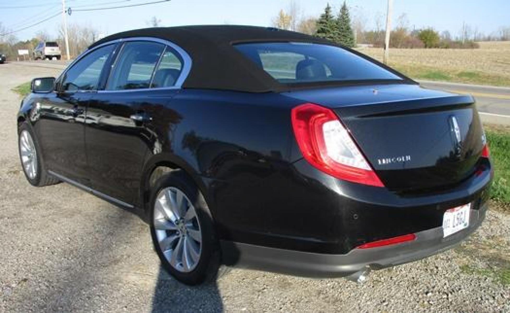 2014 Black /Black Lincoln MKS (1LNHL9EK7EG) with an 3.5L V6 DOHC 24V engine, 6-Speed Automatic transmission, located at 1725 US-68 N, Bellefontaine, OH, 43311, (937) 592-5466, 40.387783, -83.752388 - 2014 LINCOLN MKS "TUXEDO EDITION" AWD 3.7 v6, Auto, Black-Black Leather Int. w-power lumbar heated-cooled bucket seats, AM-FM-CD-MP3, Bluetooth, Sirius XM, NAVI, PW, PL, PB, PS w-tilt-cruise-controls, remote start, keyless entry, Power rear window sunshade, Presented in stunning Tuxedo Black, our - Photo #2