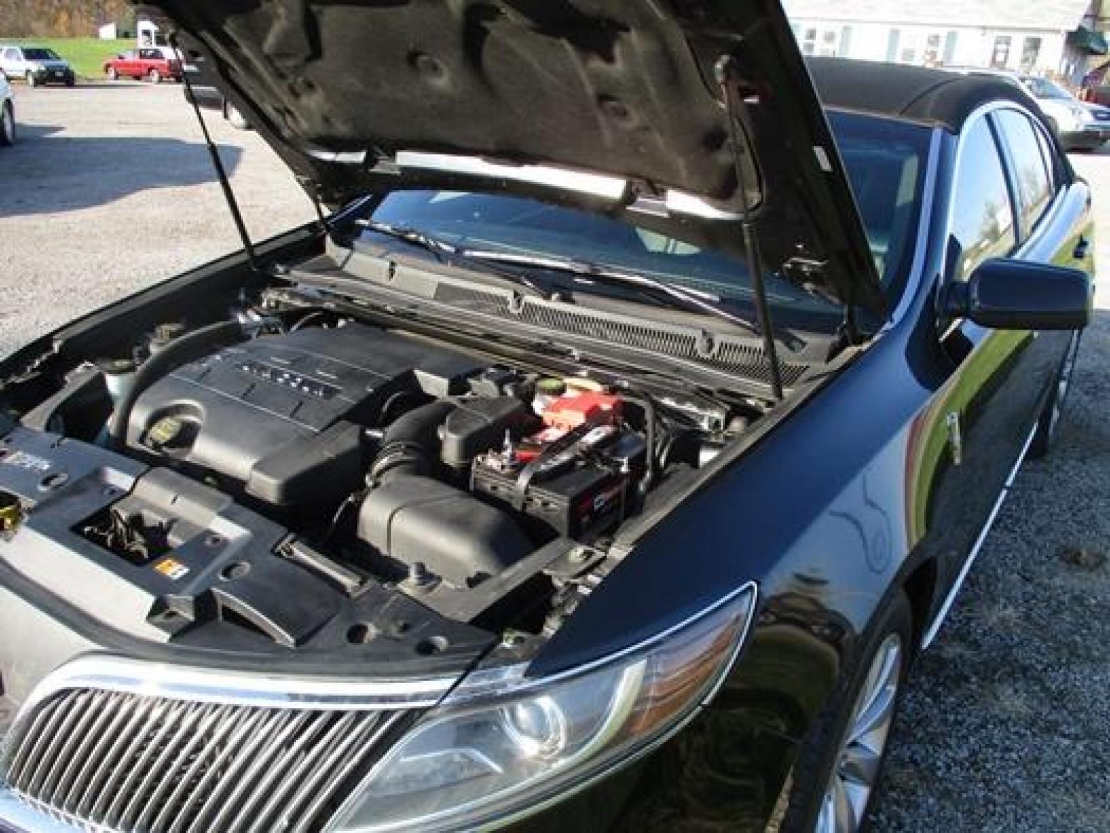 2014 Black /Black Lincoln MKS (1LNHL9EK7EG) with an 3.5L V6 DOHC 24V engine, 6-Speed Automatic transmission, located at 1725 US-68 N, Bellefontaine, OH, 43311, (937) 592-5466, 40.387783, -83.752388 - 2014 LINCOLN MKS "TUXEDO EDITION" AWD 3.7 v6, Auto, Black-Black Leather Int. w-power lumbar heated-cooled bucket seats, AM-FM-CD-MP3, Bluetooth, Sirius XM, NAVI, PW, PL, PB, PS w-tilt-cruise-controls, remote start, keyless entry, Power rear window sunshade, Presented in stunning Tuxedo Black, our - Photo #24