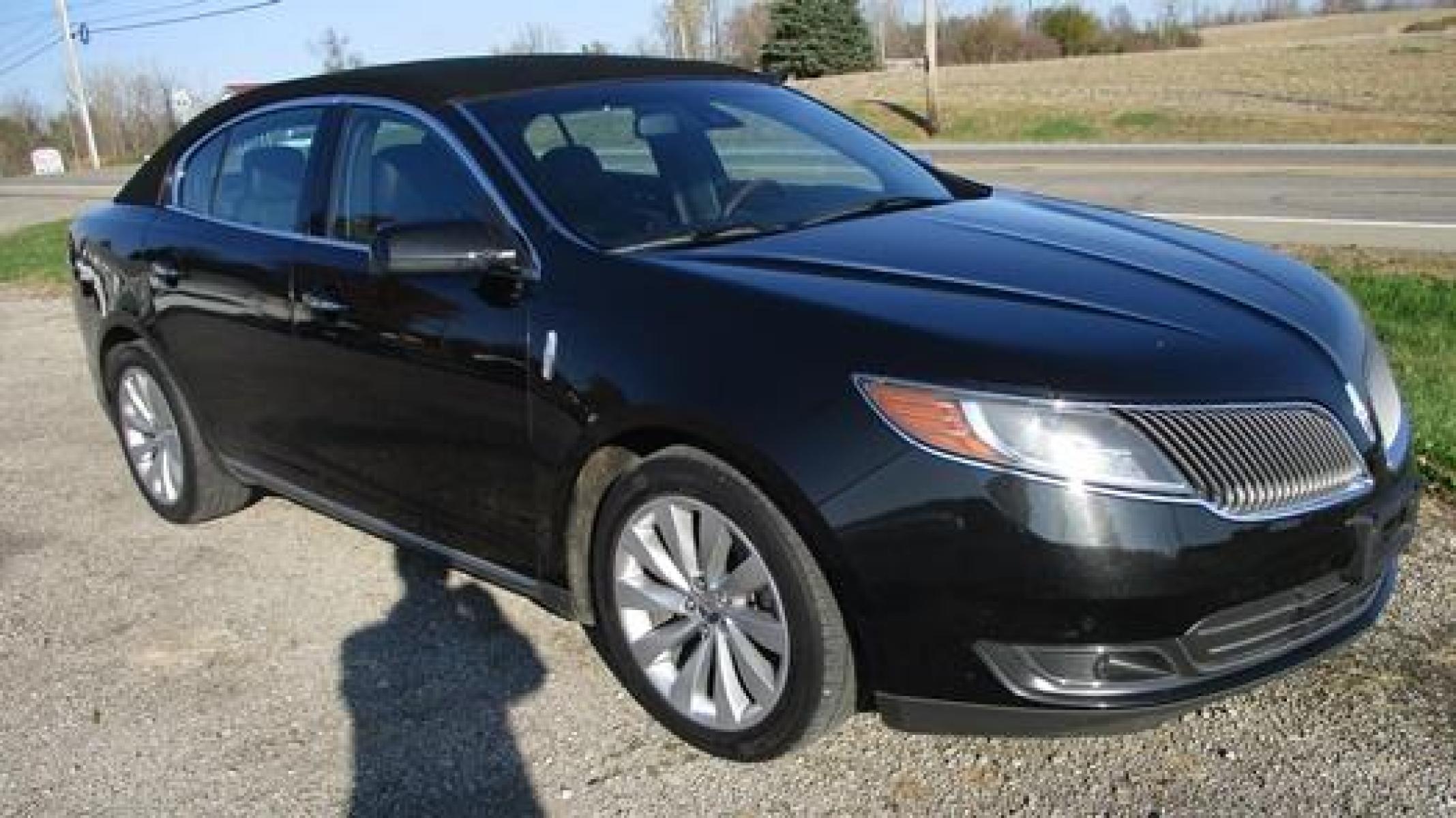 2014 Black /Black Lincoln MKS (1LNHL9EK7EG) with an 3.5L V6 DOHC 24V engine, 6-Speed Automatic transmission, located at 1725 US-68 N, Bellefontaine, OH, 43311, (937) 592-5466, 40.387783, -83.752388 - Photo #3