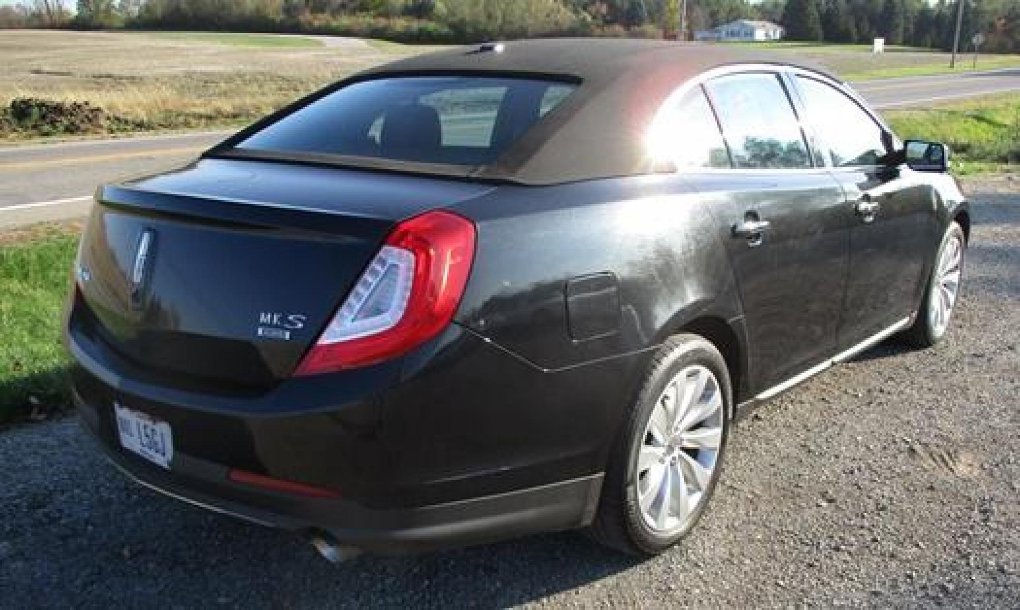 2014 Black /Black Lincoln MKS (1LNHL9EK7EG) with an 3.5L V6 DOHC 24V engine, 6-Speed Automatic transmission, located at 1725 US-68 N, Bellefontaine, OH, 43311, (937) 592-5466, 40.387783, -83.752388 - 2014 LINCOLN MKS "TUXEDO EDITION" AWD 3.7 v6, Auto, Black-Black Leather Int. w-power lumbar heated-cooled bucket seats, AM-FM-CD-MP3, Bluetooth, Sirius XM, NAVI, PW, PL, PB, PS w-tilt-cruise-controls, remote start, keyless entry, Power rear window sunshade, Presented in stunning Tuxedo Black, our - Photo #4