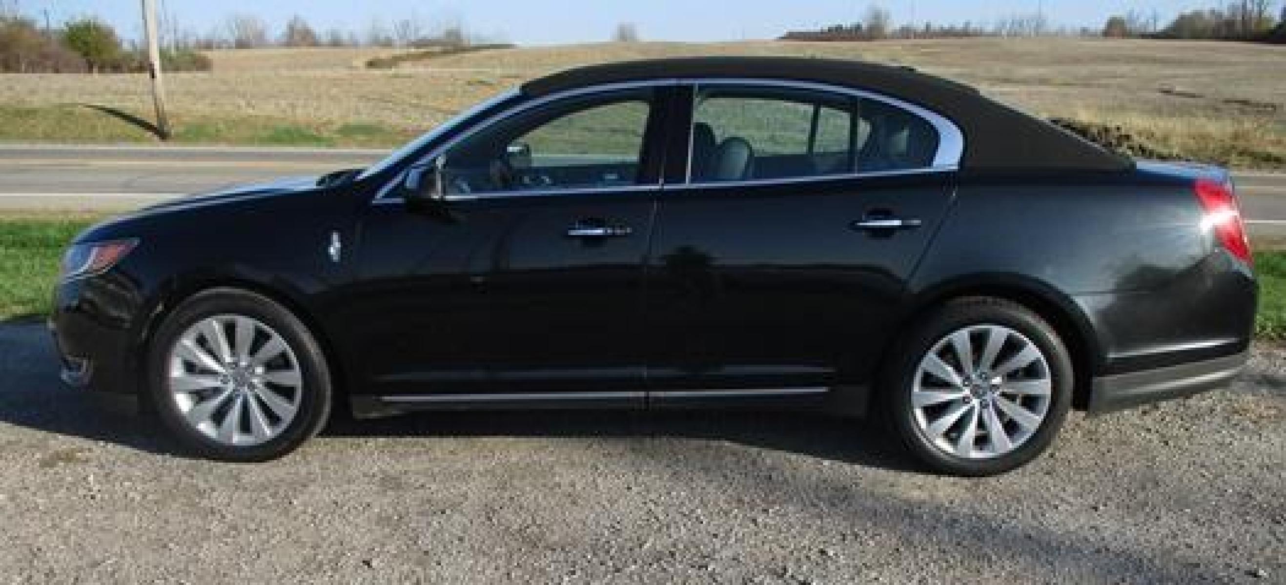 2014 Black /Black Lincoln MKS (1LNHL9EK7EG) with an 3.5L V6 DOHC 24V engine, 6-Speed Automatic transmission, located at 1725 US-68 N, Bellefontaine, OH, 43311, (937) 592-5466, 40.387783, -83.752388 - Photo #6