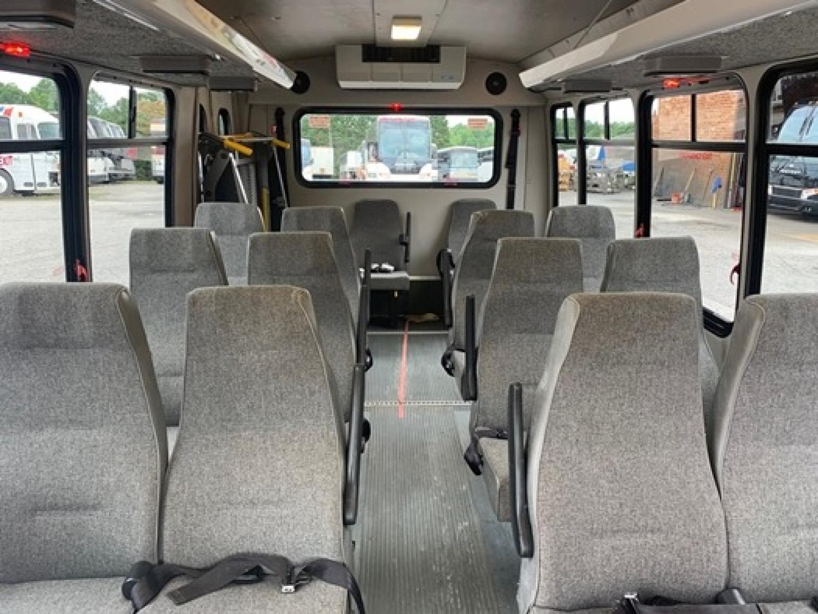 2009 White Ford E350 with an V8 engine, Auto transmission, 0.000000, 0.000000 - 2009 Ford E-350 Elkhart Conversion,- 5.4L V8 Gas Engine - Automatic Trans - Electric Entrance Door - 14 Passengers & Driver - 12 + 1 Wheelchair - High Back Seats - Retractable Seat Belts - Stainless Wheel Simulators - Front and Rear A/C - Handicap Lift - Photo #7