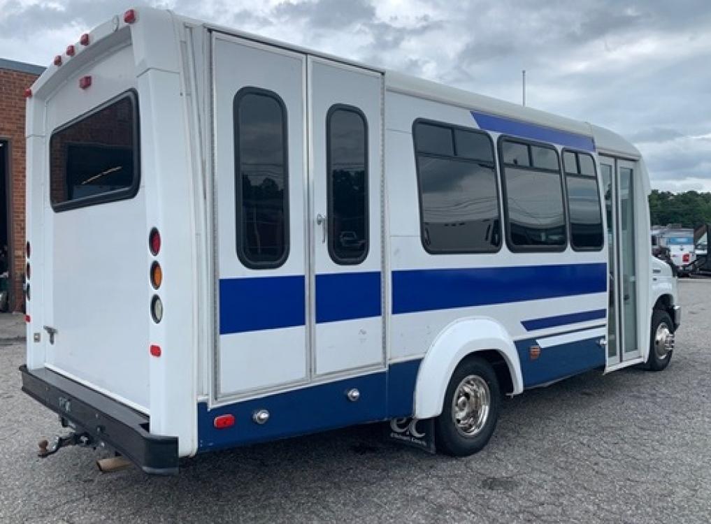 2009 White Ford E350 with an V8 engine, Auto transmission, 0.000000, 0.000000 - 2009 Ford E-350 Elkhart Conversion,- 5.4L V8 Gas Engine - Automatic Trans - Electric Entrance Door - 14 Passengers & Driver - 12 + 1 Wheelchair - High Back Seats - Retractable Seat Belts - Stainless Wheel Simulators - Front and Rear A/C - Handicap Lift - Photo #2
