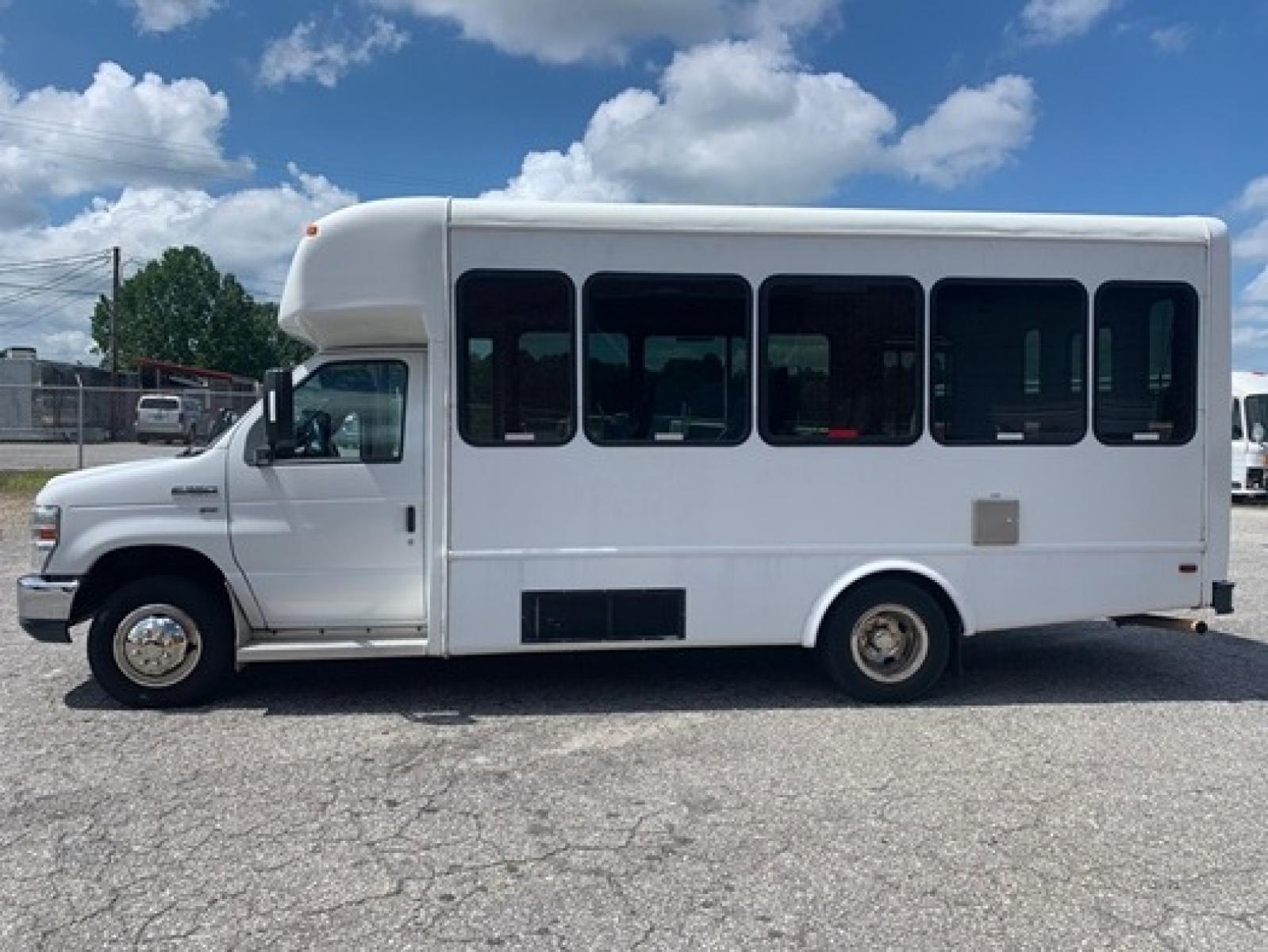 2012 White /Blue Ford E350 with an 5.4L engine, Auto transmission, 0.000000, 0.000000 - 2012 Ford E-350 Starcraft Conversion - 5.4L V8 Gas Engine - Automatic Trans - Electric Entrance Door - 8 Passengers + 2 Wheelchairs - Mid Back Seats - Retractable Seat Belts - Stainless Wheel Simulators - Front and Rear A/C - Handicap Lift - 6 New Tire s - Photo #4