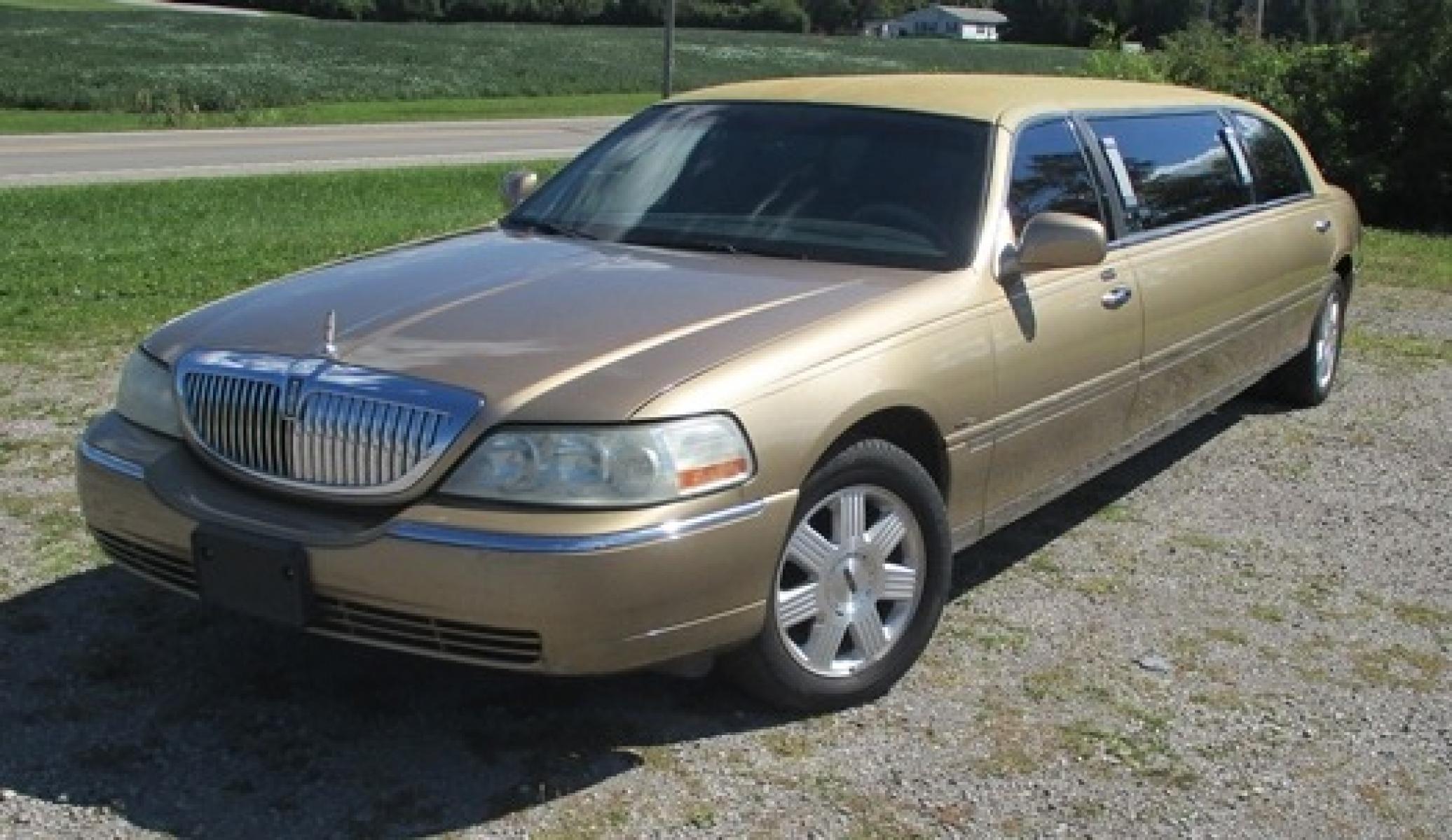 2007 Gold /Black/Tan Lincoln Town Car Executive Limo (1L1FM88W57Y) with an 4.6L V8 SOHC 16V engine, 4-Speed Automatic transmission, located at 1725 US-68 N, Bellefontaine, OH, 43311, (937) 592-5466, 40.387783, -83.752388 - 2007 LINCOLN 70” “5Dr STRETCH/KRYSTAL, Aztec Gold/black/tan leather int., AM/FM/CD, electric divider, Burl interior trim w/cup holders, magazine rack, etc., Alloy Wheels, Dual Alternators. - Photo #0