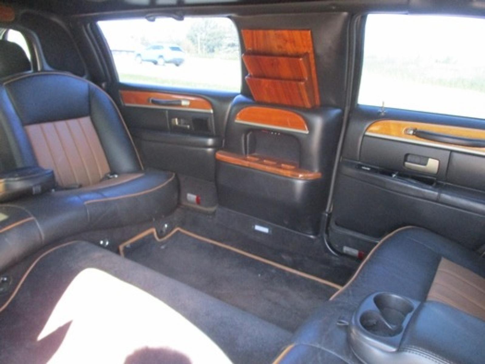 2007 Gold /Black/Tan Lincoln Town Car Executive Limo (1L1FM88W57Y) with an 4.6L V8 SOHC 16V engine, 4-Speed Automatic transmission, located at 1725 US-68 N, Bellefontaine, OH, 43311, (937) 592-5466, 40.387783, -83.752388 - 2007 LINCOLN 70” “5Dr STRETCH/KRYSTAL, Aztec Gold/black/tan leather int., AM/FM/CD, electric divider, Burl interior trim w/cup holders, magazine rack, etc., Alloy Wheels, Dual Alternators. - Photo #6