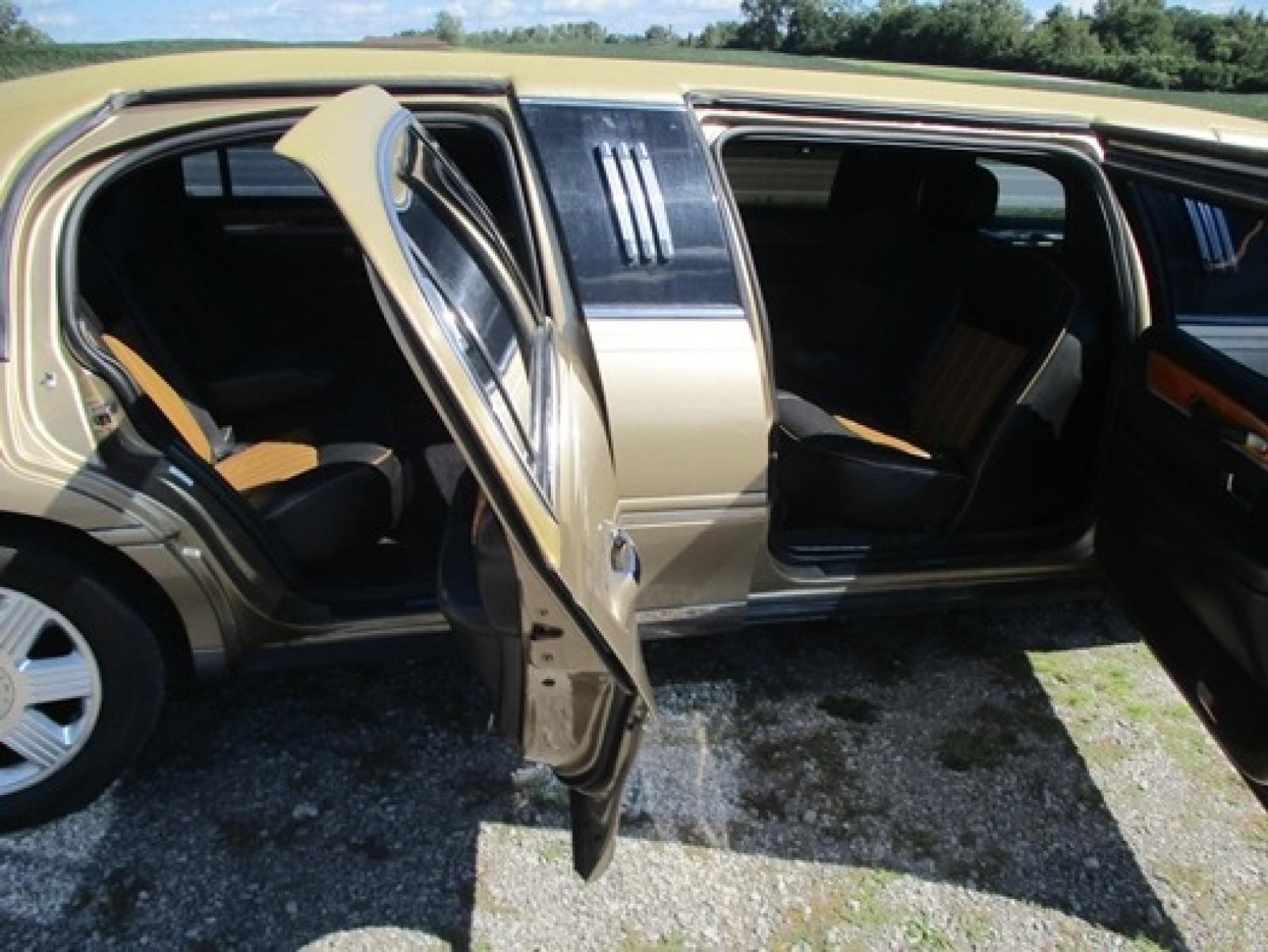 2007 Gold /Black/Tan Lincoln Town Car Executive Limo (1L1FM88W57Y) with an 4.6L V8 SOHC 16V engine, 4-Speed Automatic transmission, located at 1725 US-68 N, Bellefontaine, OH, 43311, (937) 592-5466, 40.387783, -83.752388 - 2007 LINCOLN 70” “5Dr STRETCH/KRYSTAL, Aztec Gold/black/tan leather int., AM/FM/CD, electric divider, Burl interior trim w/cup holders, magazine rack, etc., Alloy Wheels, Dual Alternators. - Photo #12