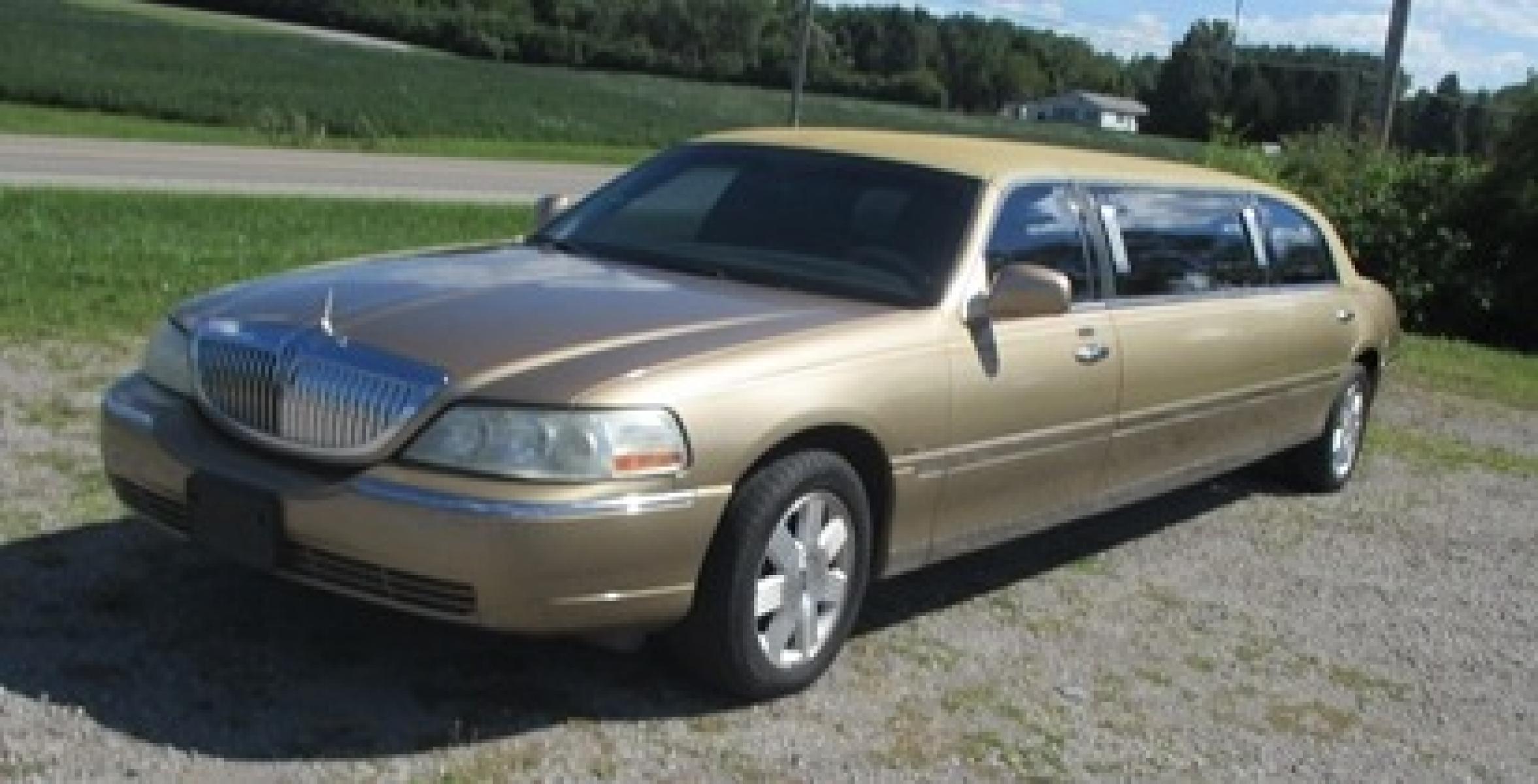 2007 Gold /Black/Tan Lincoln Town Car Executive Limo (1L1FM88W57Y) with an 4.6L V8 SOHC 16V engine, 4-Speed Automatic transmission, located at 1725 US-68 N, Bellefontaine, OH, 43311, (937) 592-5466, 40.387783, -83.752388 - 2007 LINCOLN 70” “5Dr STRETCH/KRYSTAL, Aztec Gold/black/tan leather int., AM/FM/CD, electric divider, Burl interior trim w/cup holders, magazine rack, etc., Alloy Wheels, Dual Alternators. - Photo #4
