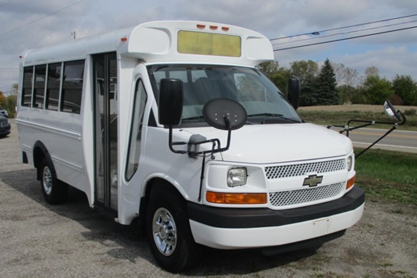 2013 White /Gray Chevrolet Express G3500 (1GB0G2BA8D1) with an 4.8L V8 OHV 16V engine, 6-Speed Automatic transmission, located at 1725 US-68 N, Bellefontaine, OH, 43311, (937) 592-5466, 40.387783, -83.752388 - 2013 CHEVROLET “3500” 14 PSG. ACTIVITY BUS/Micro Bird, 4.8 V8, Auto, White/Gray, 14 psg, pus driver, Hi-back vinyl seats, elect doors, front/rear air, PS, PB, rear exit door, chrome wheel liners, 35,000 original miles, Like New. - Photo#1