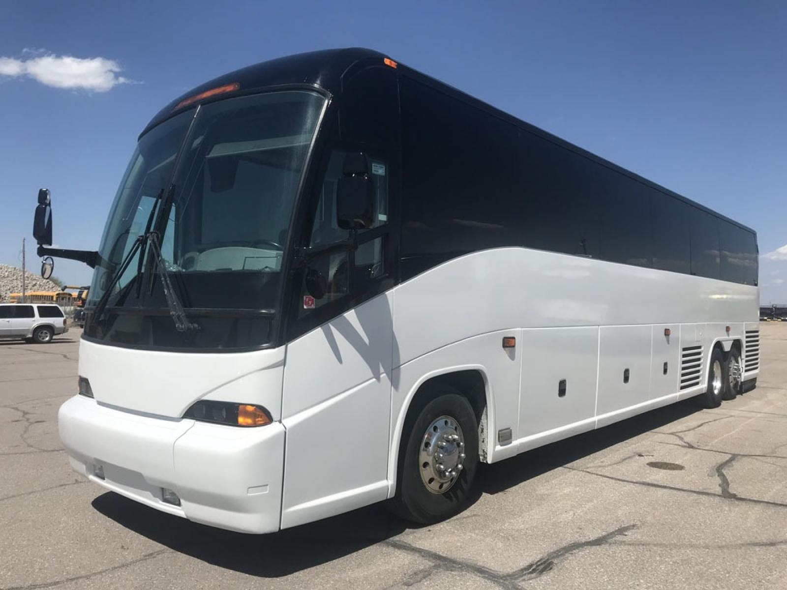 2008 White MCI J4500 with an Cummins ISM engine, ZF AUTO transmission, 0.000000, 0.000000 - 2008 MCI J4500 - Cummins ISM Diesel Engine - ZF Auto Trans. - 45' -- 56 Passengers -- Seat Belts - Flat Screens and DVD - Aluminum Wheels - Enclosed parcel racks – Restroom - Photo #0