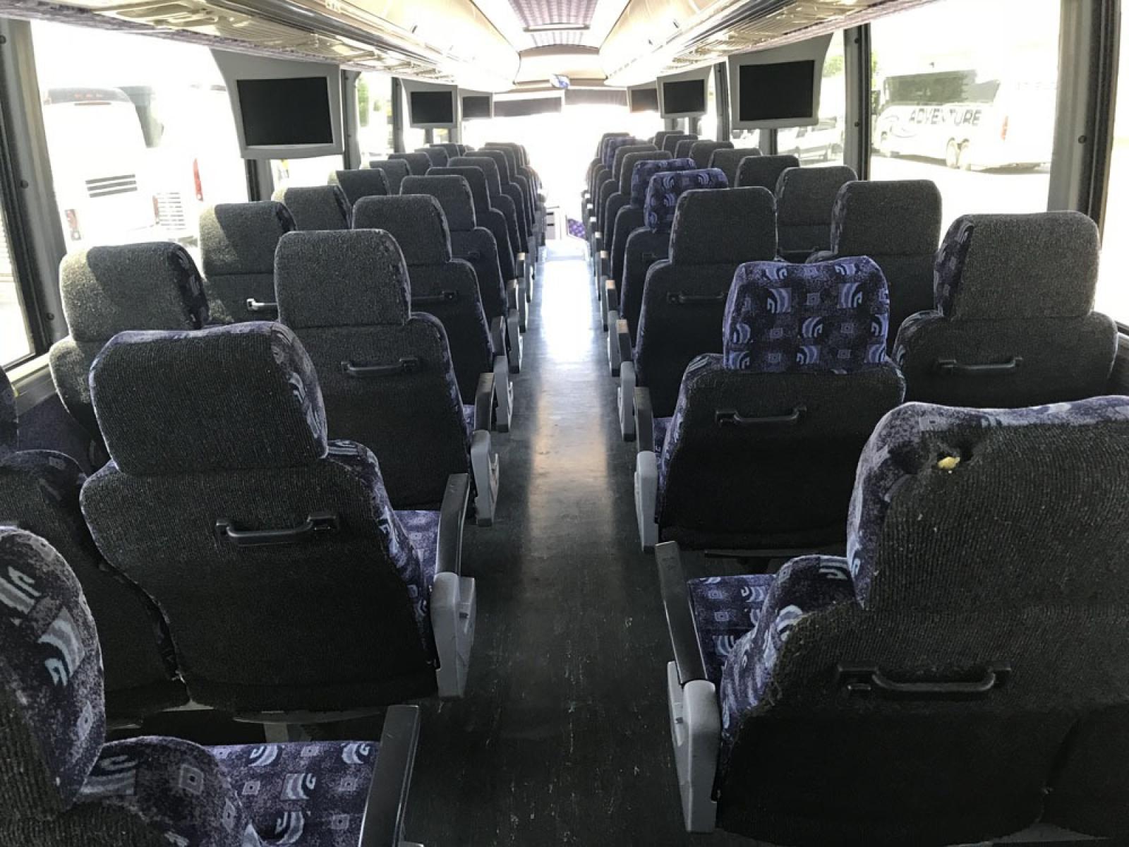 2008 White MCI J4500 with an Cummins ISM engine, ZF AUTO transmission, 0.000000, 0.000000 - 2008 MCI J4500 - Cummins ISM Diesel Engine - ZF Auto Trans. - 45' -- 56 Passengers -- Seat Belts - Flat Screens and DVD - Aluminum Wheels - Enclosed parcel racks – Restroom - Photo #5