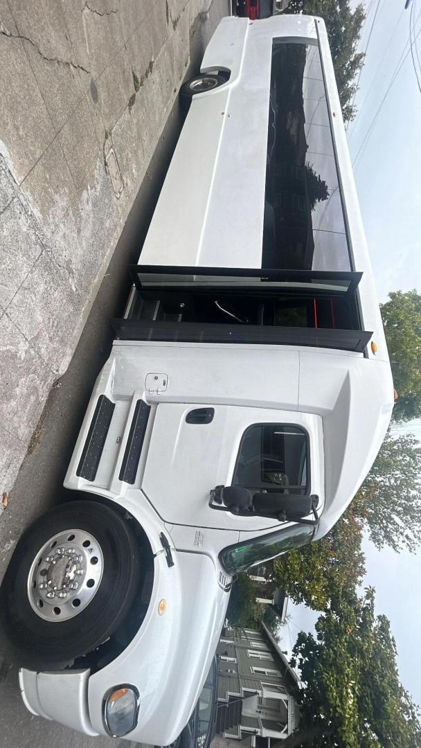 2015 Black /Black Freightliner with an Cummins engine, Allison transmission, 0.000000, 0.000000 - 2015 Freightliner Newport Coach Builders 40 passenger Cummins / Allison 122,000 Miles Limo Bench seats with In Set Bars Seat Two Tone Gray / Black RGB Lighting Window Shades Rest Room in Rear Rear TV Upgraded Sound System Gray Wood Look Flooring Egress Windows Escape Hatch and much More! Located in - Photo#2