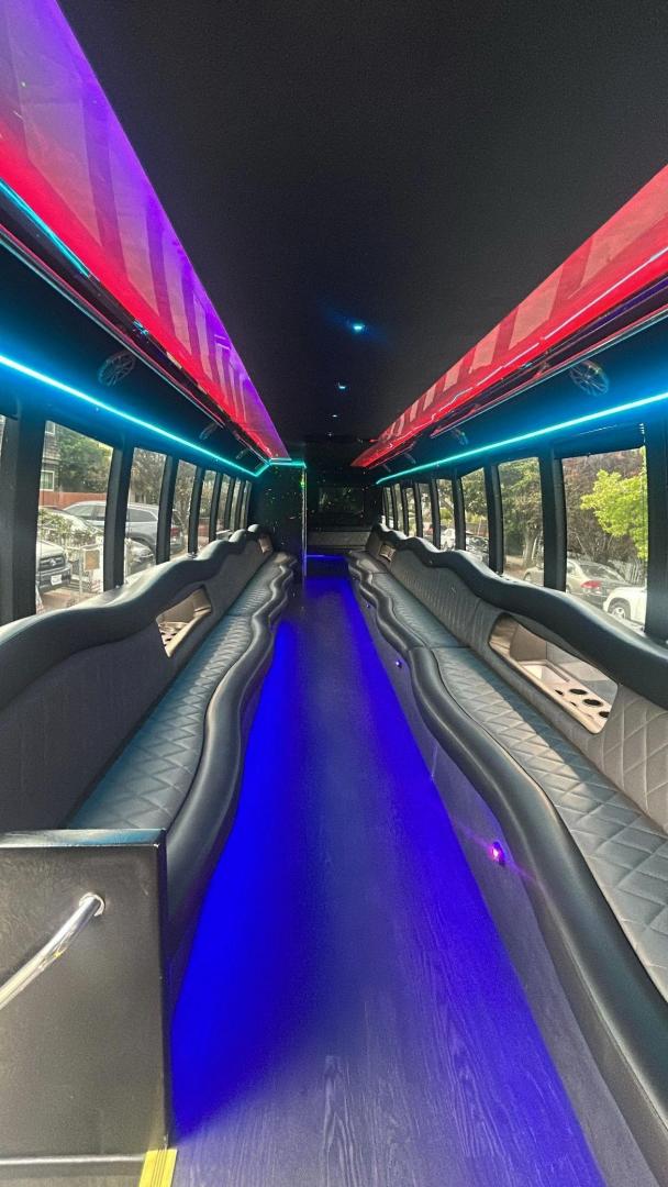 2015 Black /Black Freightliner with an Cummins engine, Allison transmission, 0.000000, 0.000000 - 2015 Freightliner Newport Coach Builders 40 passenger Cummins / Allison 122,000 Miles Limo Bench seats with In Set Bars Seat Two Tone Gray / Black RGB Lighting Window Shades Rest Room in Rear Rear TV Upgraded Sound System Gray Wood Look Flooring Egress Windows Escape Hatch and much More! Located in - Photo#5