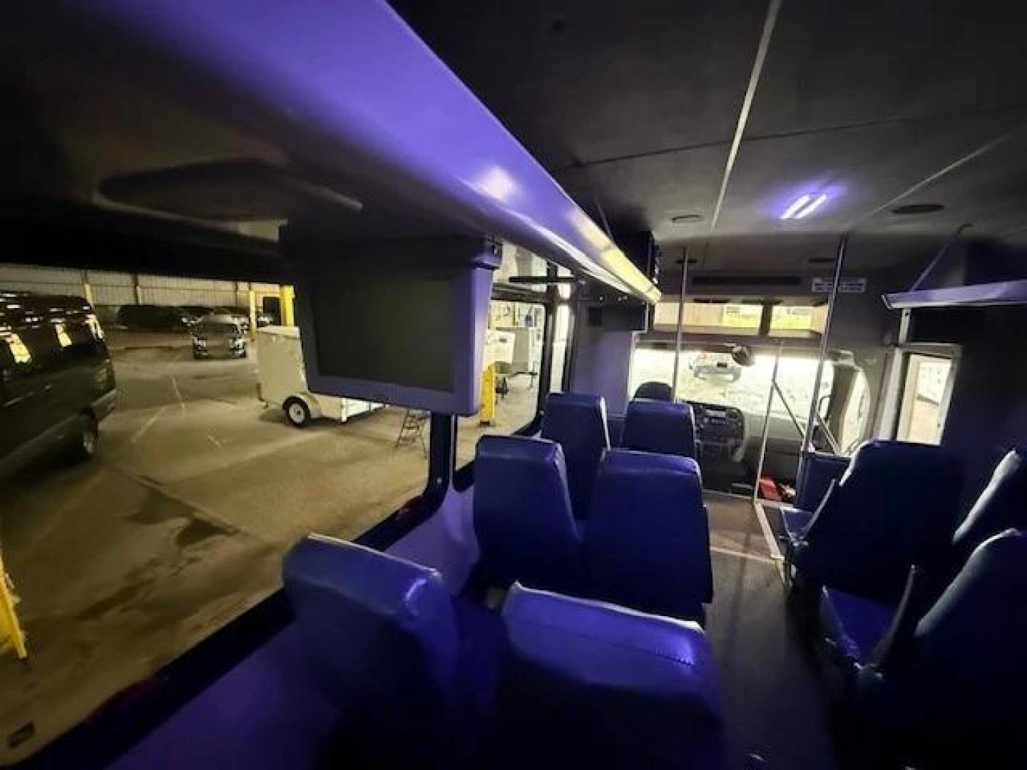 2012 White /Black Freightliner with an Cummins engine, Allison transmission, 0.000000, 0.000000 - 2012 Freightliner Executive Shuttle Glaval Bus 29 Passengers Highback Black Leatherette Seats with Armrests 192,000 miles 6.7L Cummins Diesel Engine Allison Transmission Rear Stereo Upgrade Blue Interiors Lights gray Rubber Flooring Overhead luggage Racks with TV Monitors Rear Luggage Front and Rear - Photo#5