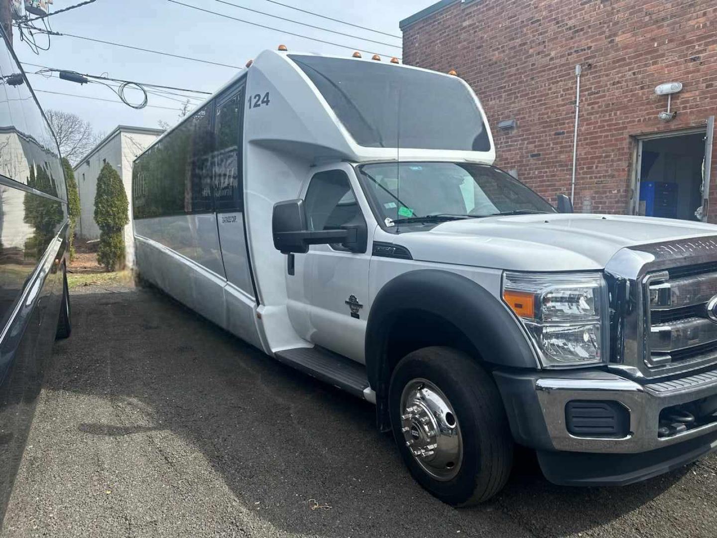 2016 White /Black Ford F550 with an Diesel engine, Auto transmission, 0.000000, 0.000000 - WELL MAINTAINED - ONE OWNER 2016 GRECH F550 GM33 MILEAGE - 151475 DIESEL WHITE / BLACK NEW DIAMOND STITCHED SEATS NEW TURBO NEW DEF NEW WATER PUMP NEW EXHAUST NEW FRONT TIRES LIMO STYLE SEATS AND BAR ULTRA RIDE AIR SYSTEM FRAMELESS COACH WINDOWS PREMIUM SOUND SYSTEM WOOD LOOK FLOORING LED INTERIOR L - Photo#0