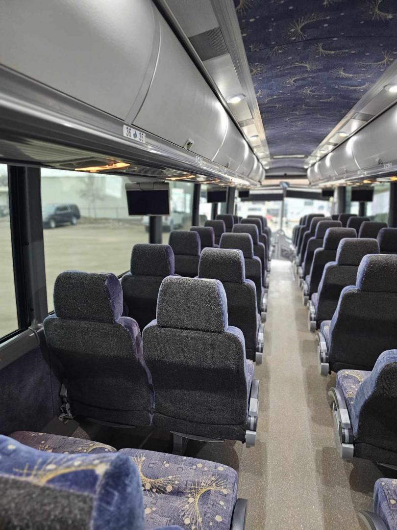 2011 Black /Blue MCI J4500 with an Cummins engine, Allison transmission, 0.000000, 0.000000 - Photo#4