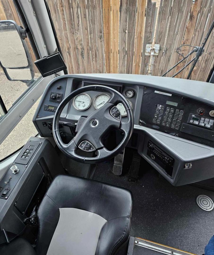 2012 White /Gray/Black CAIO with an Cummins engine, Allison transmission, 0.000000, 0.000000 - 2012 CAIO 38 PASSENGER PLUS 1 CUMMINS ALLISON WHITE EXTERIOR MILEAGE 120,000 (APPROX) RECLINER SEATS SEAT BELTS FOOT RESTS OVERHEAD STORAGE UNDERBELLY STORAGE USB PORTS DUCTED A/C READING LIGHTS TV MONITORS AND MUCH MORE ASKING CALL FOR PICTURES - Photo#7