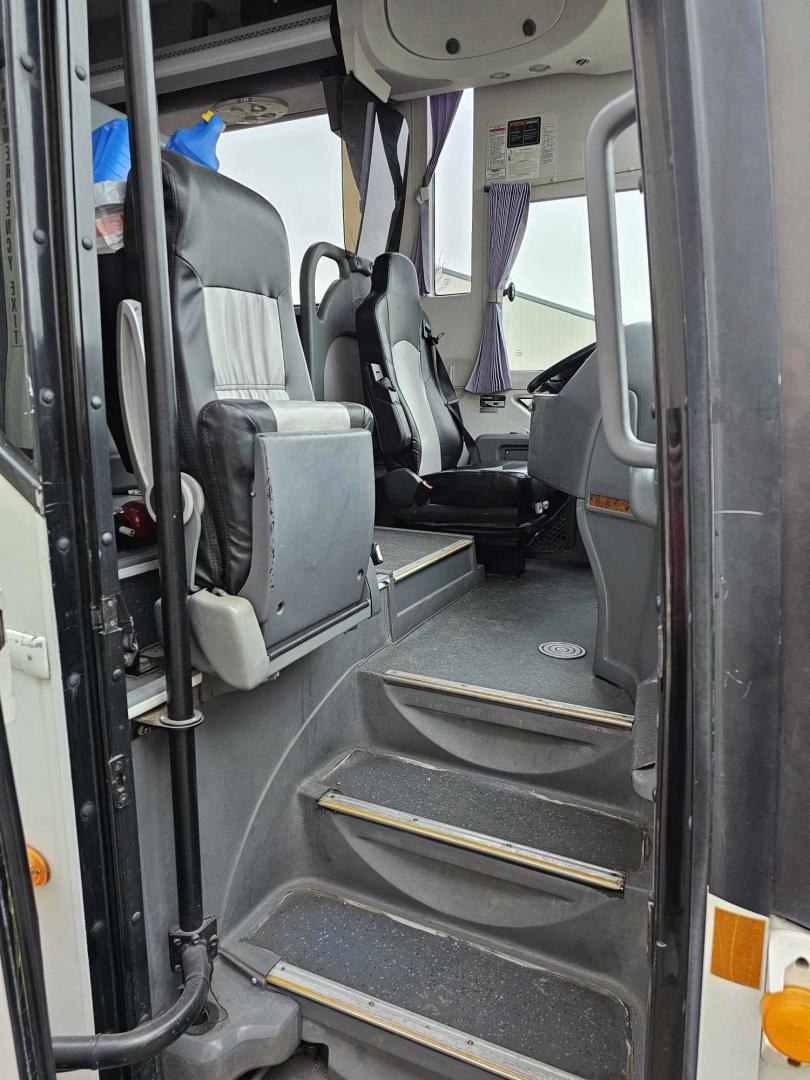 2012 White /Gray/Black CAIO with an Cummins engine, Allison transmission, 0.000000, 0.000000 - 2012 CAIO 38 PASSENGER PLUS 1 CUMMINS ALLISON WHITE EXTERIOR MILEAGE 120,000 (APPROX) RECLINER SEATS SEAT BELTS FOOT RESTS OVERHEAD STORAGE UNDERBELLY STORAGE USB PORTS DUCTED A/C READING LIGHTS TV MONITORS AND MUCH MORE ASKING CALL FOR PICTURES - Photo#6