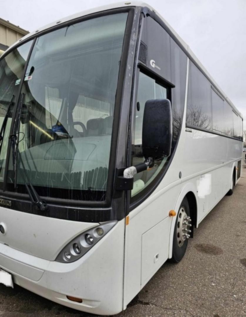 2012 White /Gray/Black CAIO with an Cummins engine, Allison transmission, 0.000000, 0.000000 - 2012 CAIO 38 PASSENGER PLUS 1 CUMMINS ALLISON WHITE EXTERIOR MILEAGE 120,000 (APPROX) RECLINER SEATS SEAT BELTS FOOT RESTS OVERHEAD STORAGE UNDERBELLY STORAGE USB PORTS DUCTED A/C READING LIGHTS TV MONITORS AND MUCH MORE ASKING CALL FOR PICTURES - Photo#0
