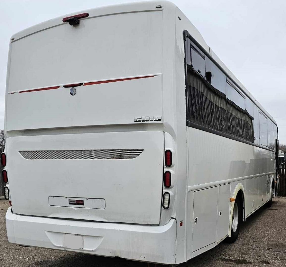 2012 White /Gray/Black CAIO with an Cummins engine, Allison transmission, 0.000000, 0.000000 - 2012 CAIO 38 PASSENGER PLUS 1 CUMMINS ALLISON WHITE EXTERIOR MILEAGE 120,000 (APPROX) RECLINER SEATS SEAT BELTS FOOT RESTS OVERHEAD STORAGE UNDERBELLY STORAGE USB PORTS DUCTED A/C READING LIGHTS TV MONITORS AND MUCH MORE ASKING CALL FOR PICTURES - Photo#1