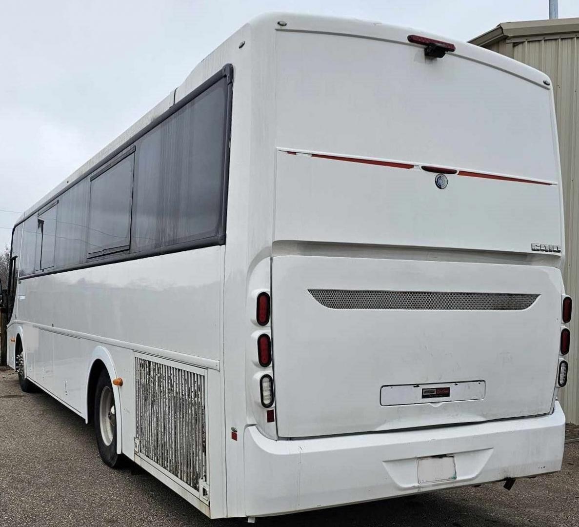 2012 White /Gray/Black CAIO with an Cummins engine, Allison transmission, 0.000000, 0.000000 - 2012 CAIO 38 PASSENGER PLUS 1 CUMMINS ALLISON WHITE EXTERIOR MILEAGE 120,000 (APPROX) RECLINER SEATS SEAT BELTS FOOT RESTS OVERHEAD STORAGE UNDERBELLY STORAGE USB PORTS DUCTED A/C READING LIGHTS TV MONITORS AND MUCH MORE ASKING CALL FOR PICTURES - Photo#2