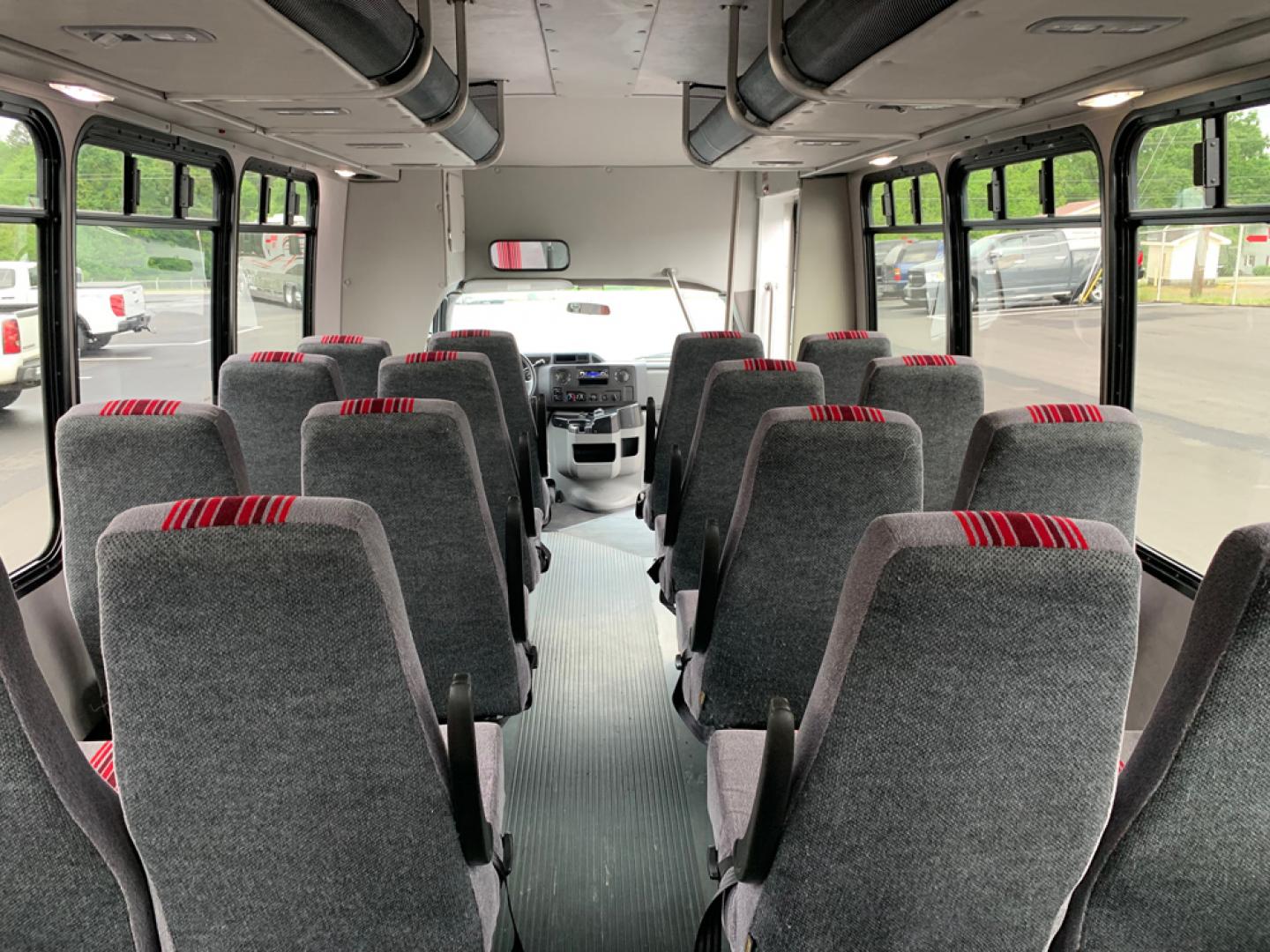 2010 White /Red/Gray Ford E450 with an V10 engine, Auto transmission, 0.000000, 0.000000 - 2010 Ford E-450 – Goshen Coach - 25 Passengers + Driver - 6.8L V10 Engine – Automatic - High Back Reclining Seats – Seat Belts -Electric Entrance Doors – Overhead Storage – Reading Lights – Front/Rear AC – Stainless Wheel Simulators - Photo#9