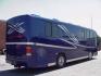 2002 Blue /Red/Gray MCI F3500 with an 300 Cummins engine, Allison transmission, 0.000000, 0.000000 - 2002 MCI F3500 300 Cummins Diesel Engine – Allison Automatic Transmission - 35' Long - Raised Roof - Front Lounge – Kitchen - Restroom with Shower - Rear Bedroom - Slide outs in luggage bays - 12.5 KW Kubota Generator - 3 Roof Heat Pumps - Aluminum wheels - 11,000 Total Coach Miles - Photo#3