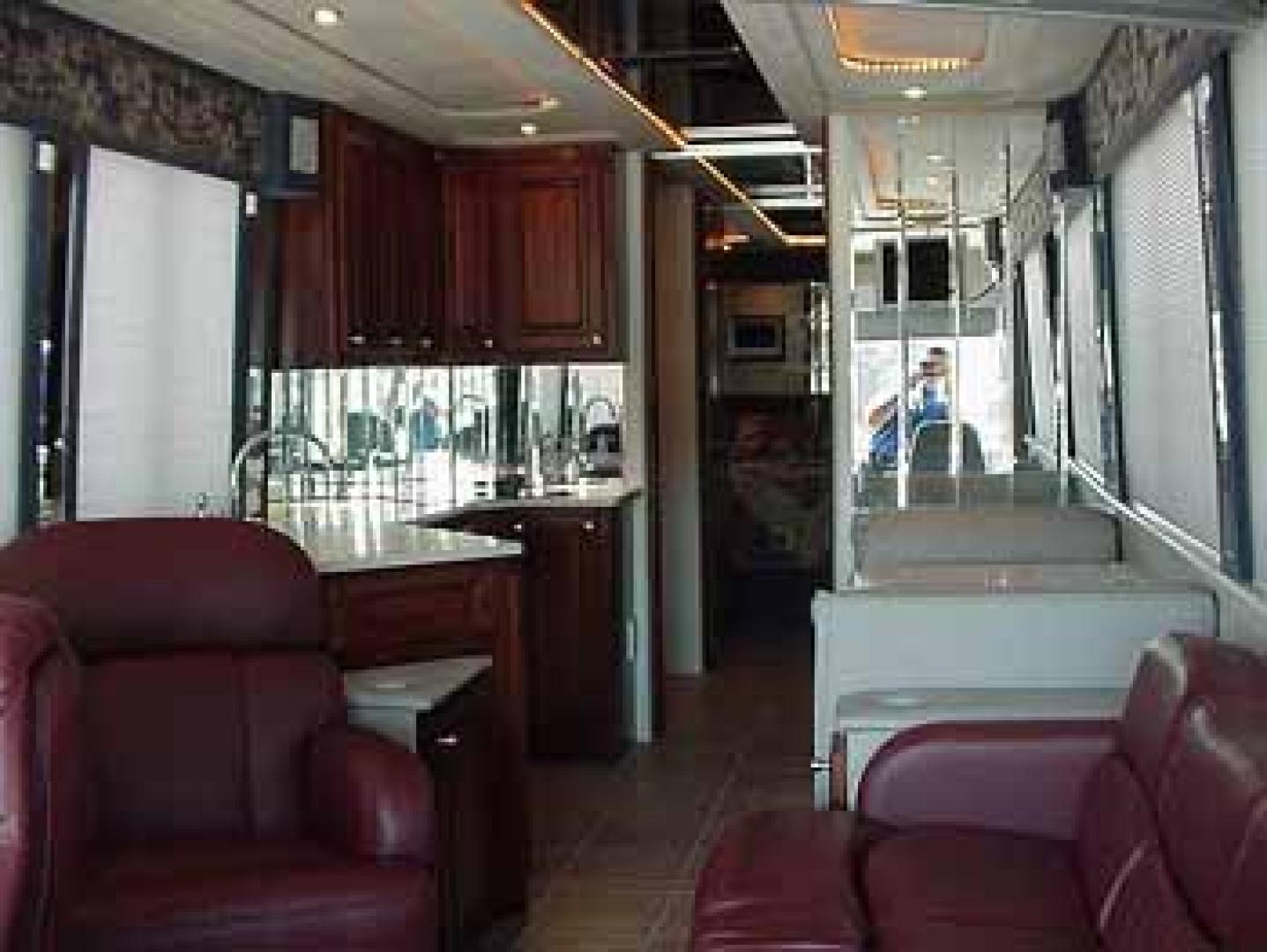 2002 Blue /Red/Gray MCI F3500 with an 300 Cummins engine, Allison transmission, 0.000000, 0.000000 - 2002 MCI F3500 300 Cummins Diesel Engine – Allison Automatic Transmission - 35' Long - Raised Roof - Front Lounge – Kitchen - Restroom with Shower - Rear Bedroom - Slide outs in luggage bays - 12.5 KW Kubota Generator - 3 Roof Heat Pumps - Aluminum wheels - 11,000 Total Coach Miles - Photo#6