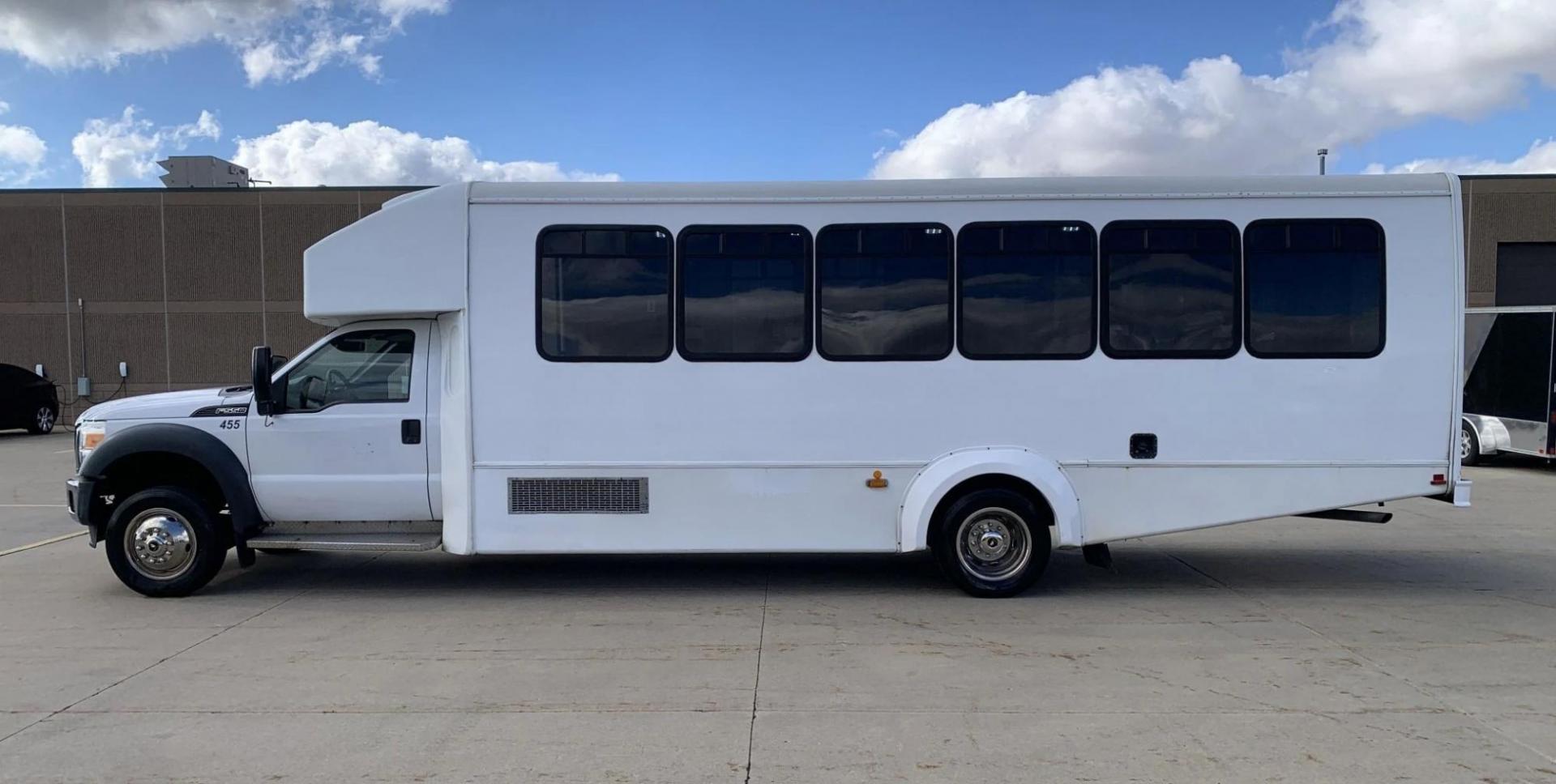 2015 White /Gray Ford F550 with an 6.8L V10 engine, Auto transmission, 0.000000, 0.000000 - 2015 FORD F550 SUPER DUTY GOSHEN COACH 6.8L V10 GAS 24 PASSENGERS PLUS WHEEL CHAIR POSITIONS, AND DRIVER REAR LIFT WITH TWO TIE DOWNS BLACK RUBBER FLOORING REAR HEAT AND A/C BI-FOLD ELECTRIC DOOR AM, FM CD PLAYER RADIO ISLE GRAB HANDLES LAP BELTS GRAY CLOTH SEAT AND MUCH MORE. STILL IN SERVICE LOCAT - Photo#5