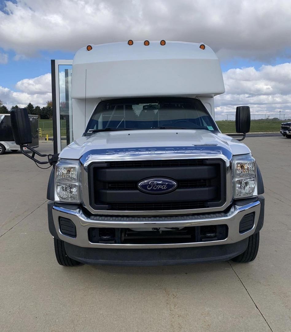 2015 White /Gray Ford F550 with an 6.8L V10 engine, Auto transmission, 0.000000, 0.000000 - 2015 FORD F550 SUPER DUTY GOSHEN COACH 6.8L V10 GAS 24 PASSENGERS PLUS WHEEL CHAIR POSITIONS, AND DRIVER REAR LIFT WITH TWO TIE DOWNS BLACK RUBBER FLOORING REAR HEAT AND A/C BI-FOLD ELECTRIC DOOR AM, FM CD PLAYER RADIO ISLE GRAB HANDLES LAP BELTS GRAY CLOTH SEAT AND MUCH MORE. STILL IN SERVICE LOCAT - Photo#0