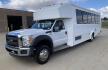 2015 White /Gray Ford F550 with an V10 engine, Auto transmission, 0.000000, 0.000000 - 2015 FORD F550 SUPER DUTY GOSHEN COACH 6.8L V10 GAS 24 PASSENGERS PLUS WHEEL CHAIR POSITIONS, AND DRIVER REAR LIFT WITH TWO TIE DOWNS BLACK RUBBER FLOORING REAR HEAT AND A/C BI-FOLD ELECTRIC DOOR AM, FM CD PLAYER RADIO ISLE GRAB HANDLES LAP BELTS GRAY CLOTH SEAT AND MUCH MORE. STILL IN SERVICE LOCAT - Photo#2