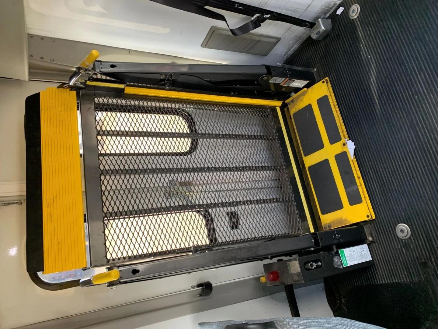 2015 White /Gray Ford F550 with an V10 engine, Auto transmission, 0.000000, 0.000000 - 2015 FORD F550 SUPER DUTY GOSHEN COACH 6.8L V10 GAS 24 PASSENGERS PLUS WHEEL CHAIR POSITIONS, AND DRIVER REAR LIFT WITH TWO TIE DOWNS BLACK RUBBER FLOORING REAR HEAT AND A/C BI-FOLD ELECTRIC DOOR AM, FM CD PLAYER RADIO ISLE GRAB HANDLES LAP BELTS GRAY CLOTH SEAT AND MUCH MORE. STILL IN SERVICE LOCAT - Photo#11