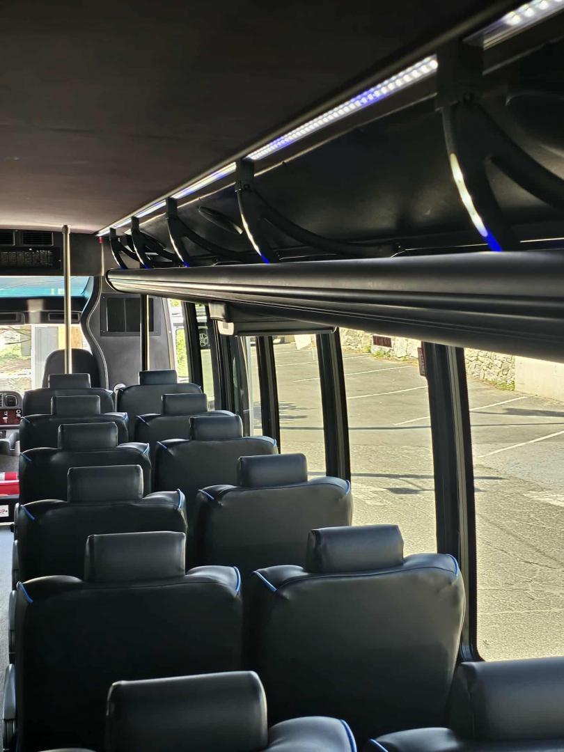 2016 White /Black Freightliner GM40 , Auto transmission, 0.000000, 0.000000 - 2016 GRECH GM40 DIESEL - 35 PASS PLUS DRIVER AND CO-PILOT - WHITE EXTERIOR - NEW BLACK SEATS W / BLUE PIPING AND LAP BELTS - REAR RESTROOM - USB PORTS - BACKUP CAMERA - OVERHEAD LUGGAGE / TV MONITORS - LARGE REAR LUGGAGE - GRAY WOOD LOOK FLOORING - TIRES 50% OR BETTER - DOT APPROVED - LOCATED IN NE - Photo#11