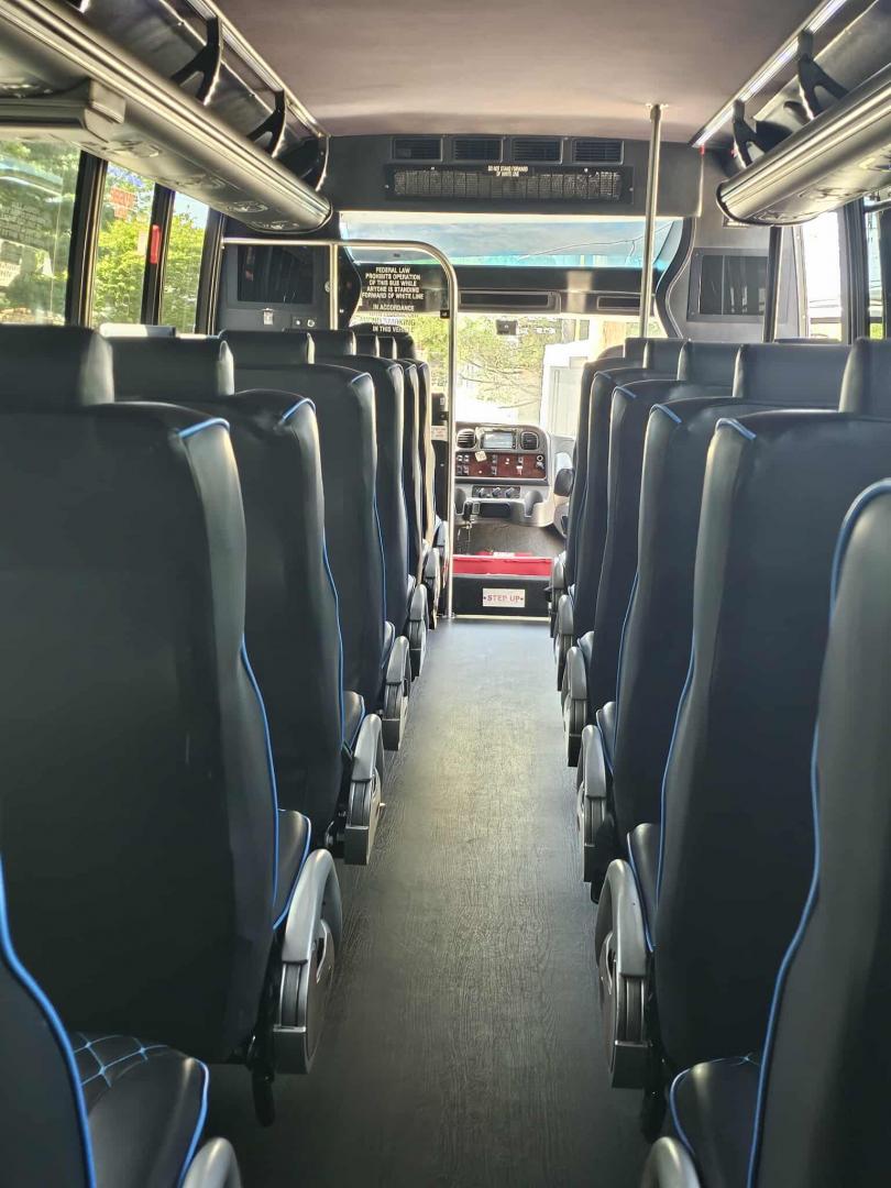 2016 White /Black Freightliner GM40 , Auto transmission, 0.000000, 0.000000 - 2016 GRECH GM40 DIESEL - 35 PASS PLUS DRIVER AND CO-PILOT - WHITE EXTERIOR - NEW BLACK SEATS W / BLUE PIPING AND LAP BELTS - REAR RESTROOM - USB PORTS - BACKUP CAMERA - OVERHEAD LUGGAGE / TV MONITORS - LARGE REAR LUGGAGE - GRAY WOOD LOOK FLOORING - TIRES 50% OR BETTER - DOT APPROVED - LOCATED IN NE - Photo#13