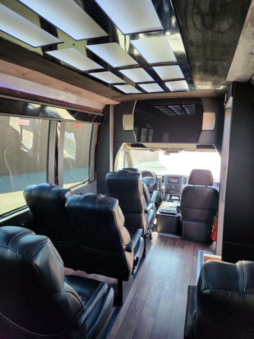 2017 Black /Black Mercedes-Benz Sprinter with an Gas engine, Auto transmission, 0.000000, 0.000000 - 2017 SPRINTER BUS BY BATTISTI WIDE BODY MB SPRINTER BUS 13 + 2 PASSENGER - REAR LUGGAGE - CO-PILOT RACK - EXECUTIVE STYLE SEATING - ICE COOLER BETWEEN DRIVER AND COPILOT - WOOD LOOK FLOORING - CUSTOM FRONT BUMPER WITH RUNNING BOARDS - MAYBACH CEILING WITH FLOOR AND CEILING LIGHTS - NICE SOUND SYSTEM - Photo#6