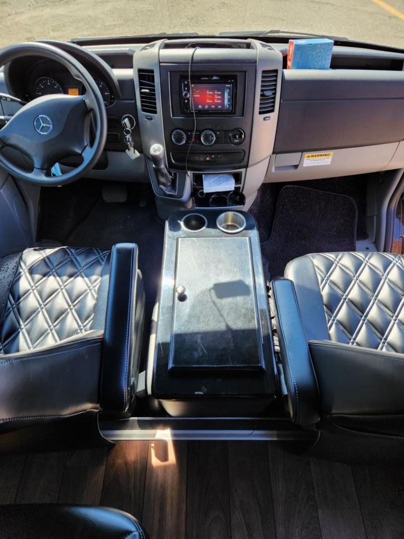 2017 Black /Black Mercedes-Benz Sprinter with an Gas engine, Auto transmission, 0.000000, 0.000000 - 2017 SPRINTER BUS BY BATTISTI WIDE BODY MB SPRINTER BUS 13 + 2 PASSENGER - REAR LUGGAGE - CO-PILOT RACK - EXECUTIVE STYLE SEATING - ICE COOLER BETWEEN DRIVER AND COPILOT - WOOD LOOK FLOORING - CUSTOM FRONT BUMPER WITH RUNNING BOARDS - MAYBACH CEILING WITH FLOOR AND CEILING LIGHTS - NICE SOUND SYSTEM - Photo#7