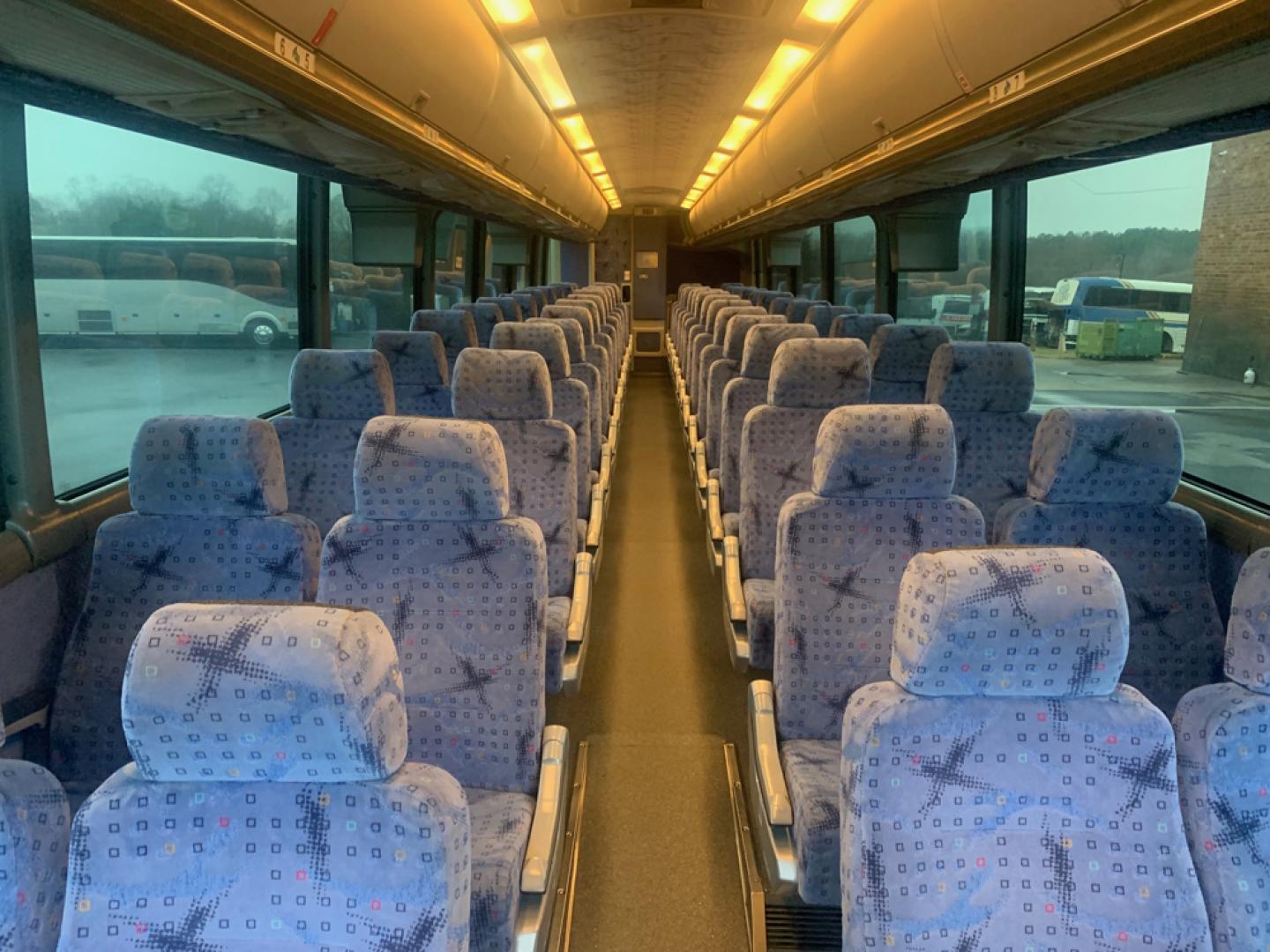 2007 White /Gray MCI J4500 with an Cat Diesel engine, ZF AUTO transmission, located at 1725 US-68 N, Bellefontaine, OH, 43311, (937) 592-5466, 40.387783, -83.752388 - 2007 MCI J4500 - Cat Diesel Engine - ZF Auto Trans. - 45' - 56 Passengers - Seat Belts - 6 Flat Screens and DVD - Enclosed parcel racks – Restroom - Aluminum Wheels - Photo#10