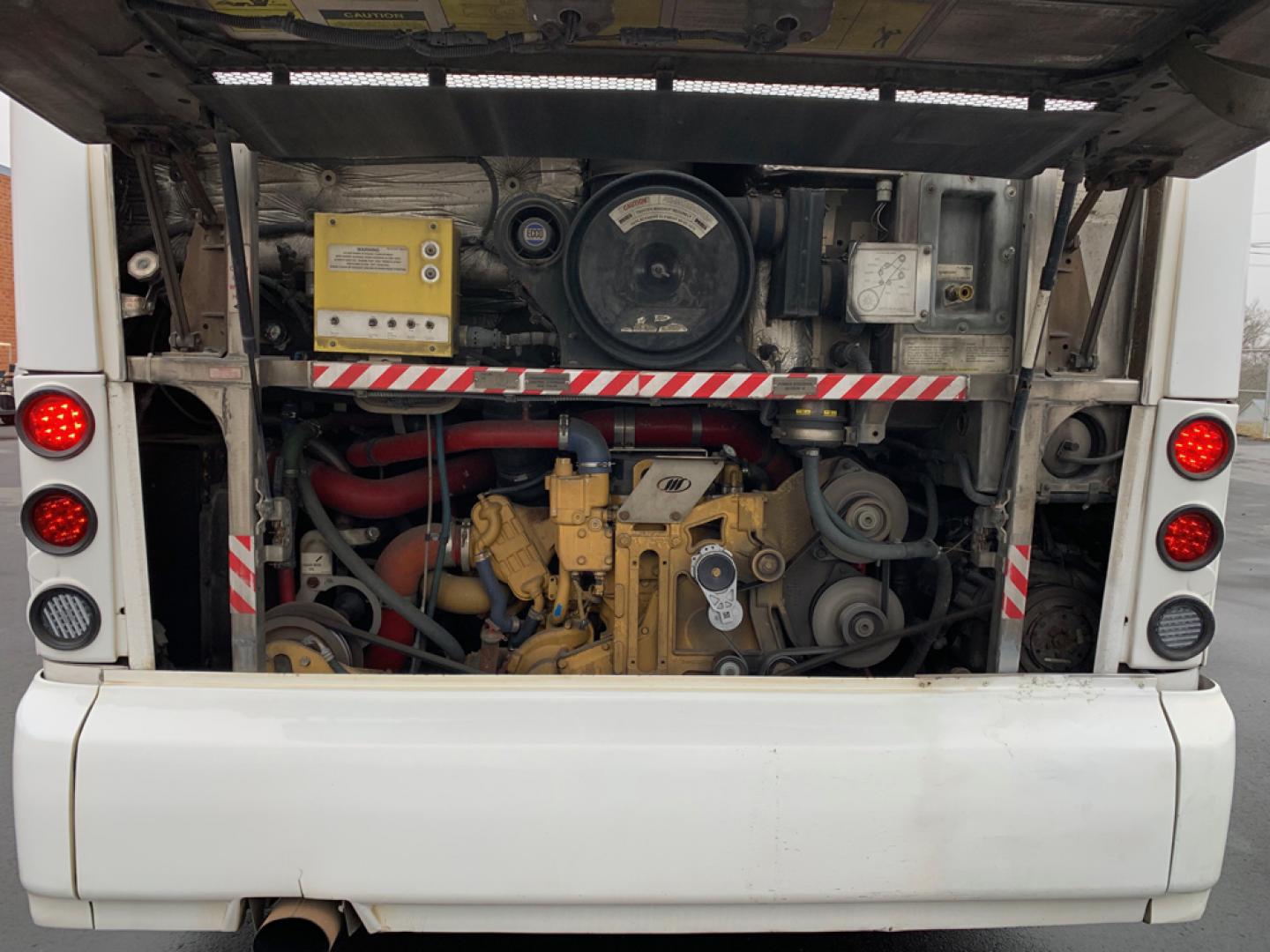 2007 White /Gray MCI J4500 with an Cat Diesel engine, ZF AUTO transmission, located at 1725 US-68 N, Bellefontaine, OH, 43311, (937) 592-5466, 40.387783, -83.752388 - 2007 MCI J4500 - Cat Diesel Engine - ZF Auto Trans. - 45' - 56 Passengers - Seat Belts - 6 Flat Screens and DVD - Enclosed parcel racks – Restroom - Aluminum Wheels - Photo#15