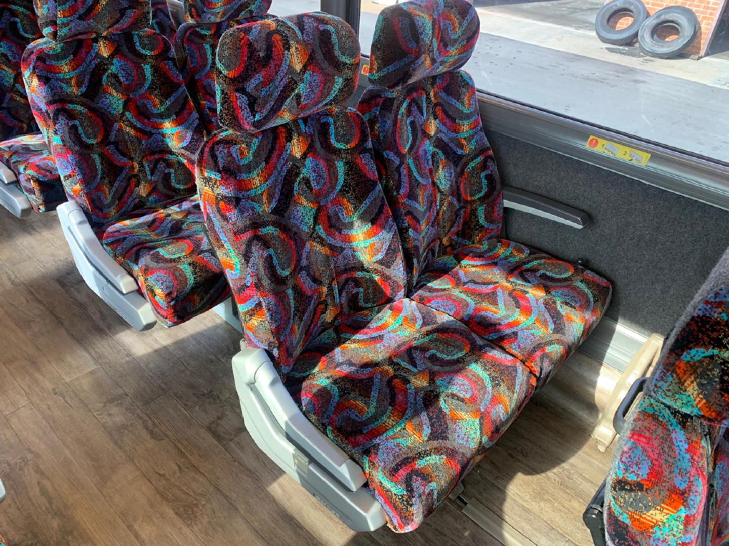 1999 White /Gray/ Red/Blue MCI EL3 with an Series 60 Detroit Diesel engine, Allison transmission, located at 1725 US-68 N, Bellefontaine, OH, 43311, (937) 592-5466, 40.387783, -83.752388 - Series 60 Diesel Engine - Allison Auto Trans. - 45' - 54 Passengers - 6 Flat Screens and DVD - Enclosed parcel racks – Restroom - 110V Outlets - Aluminum Wheels - Two Owner Coach - - Photo#11