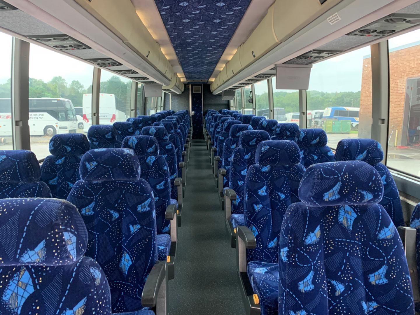 1999 White / Blue Prevost HS-45 with an Series 60 Detroit Diesel engine, Allison transmission, 0.000000, 0.000000 - 1999 PREVOST H3-45 - Series 60 Detroit Diesel - Allison Automatic Transmission - 45' - 56 Passengers - - 4 Monitors and DVD - Handicap Lift - Enclosed Parcel Racks - 110V Plugs - Updated Interior - Wheel Simulators - Photo#10