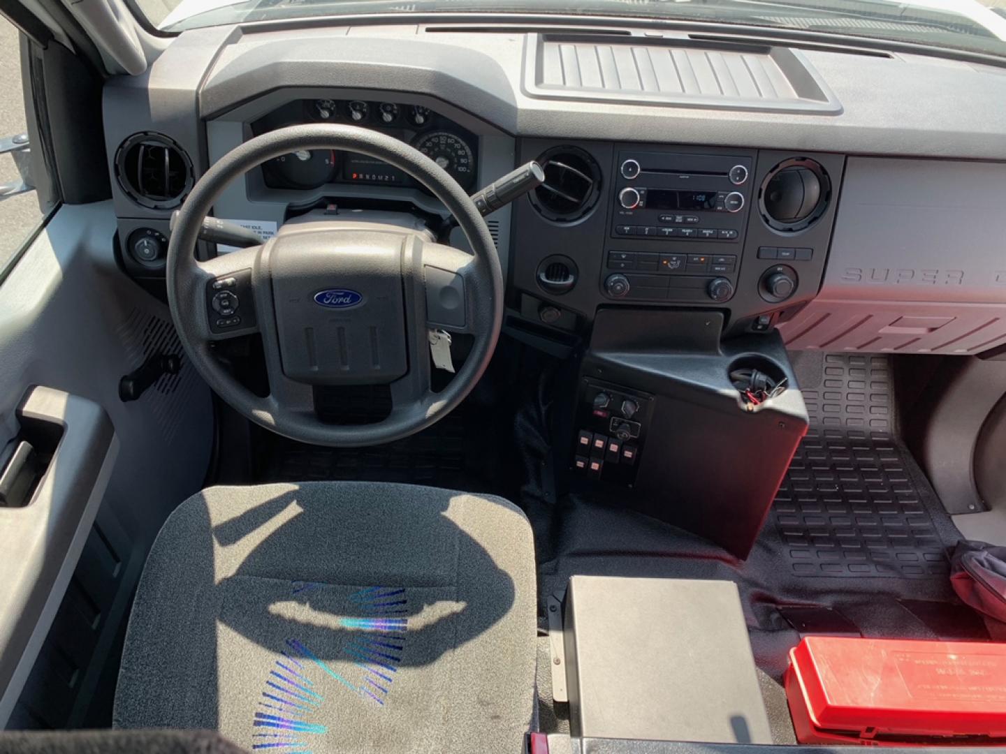 2012 White /Gray/Blue Ford F550 with an Diesel engine, Auto transmission, 0.000000, 0.000000 - 2012 FORD F-550 6.7L, - 32 Passengers & Driver - Diesel Engine - Automatic Trans - Electric Entrance Door - - High Back Reclining Seats - Seat Belts - 28 Passengers with Luggage - Overhead Luggage Racks - Stainless Wheel Simulators - Front and 2 Rear A/C's - Exterior Storage Box - One Owner - Photo#10