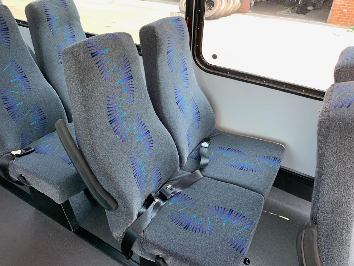 2012 White /Gray/Blue Ford F550 with an Diesel engine, Auto transmission, 0.000000, 0.000000 - 2012 FORD F-550 6.7L, - 32 Passengers & Driver - Diesel Engine - Automatic Trans - Electric Entrance Door - - High Back Reclining Seats - Seat Belts - 28 Passengers with Luggage - Overhead Luggage Racks - Stainless Wheel Simulators - Front and 2 Rear A/C's - Exterior Storage Box - One Owner - Photo#12