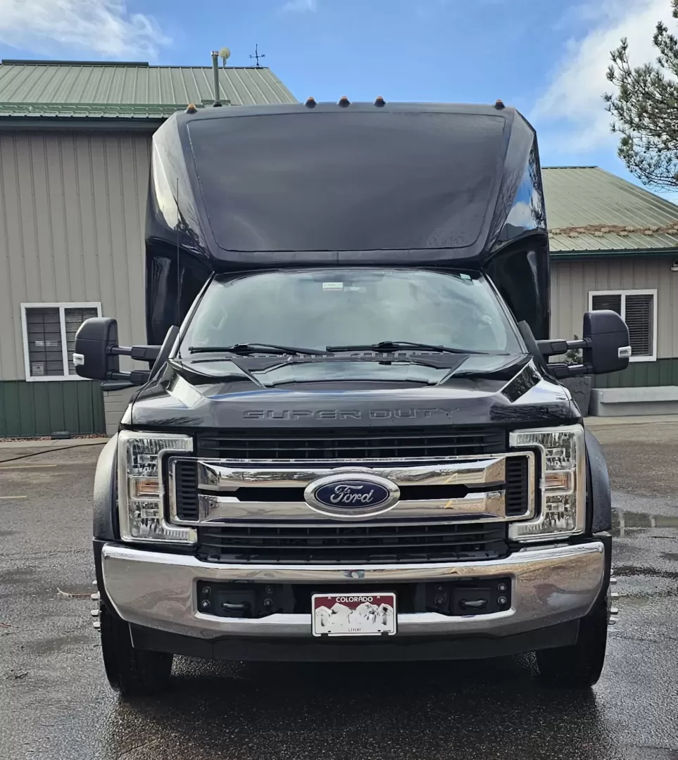 2018 Black /Black Ford F550 with an Diesel engine, Allison transmission, 0.000000, 0.000000 - 2018 GRECH GM33 EXECUTIVE SHUTTLE - 6.7L DIESEL ALLISON 27 PASSENGERS PLUS DRIVER AND COPILOT RACK BLACK EXTERIOR KELDERMAN AIR RIDE PASSENGERS VIEWING WINDOW BLACK GRECH SEATING WITH RETRACTABLE LAP BELTS, CENTER ARMRESTS, RECLINER SEATS (2) TWO TV'S ON FRONT WALL PILLARS OVERHEAD RACKS PLUG DOOR R - Photo#6