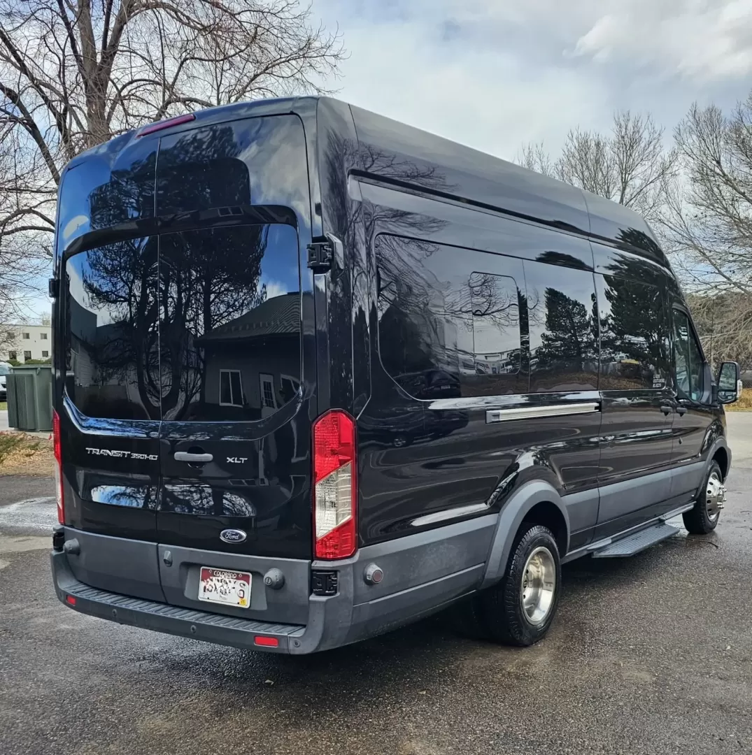 2017 Black /Black Ford Transit with an Gas engine, Auto transmission, 0.000000, 0.000000 - 2017 FORD TRANSIT 3.7L GAS ENGINE BUILT BY PINNICALE INTERIOR BLACK DIAMOND PATTERN LIMO BENCH SEATS 10 PASSENGERS PLUS DRIVER AND COPILOT - RACK LIMO BENCH SEATING POWER PARTITION TV'S FRONT AND REAR COVED RGB LIGHTING ON SIDE WALLS OVER HEAD DOME LIGHTS GRAY WOOD LOOK FLOORING MAYBACH CEILING LIGH - Photo#12